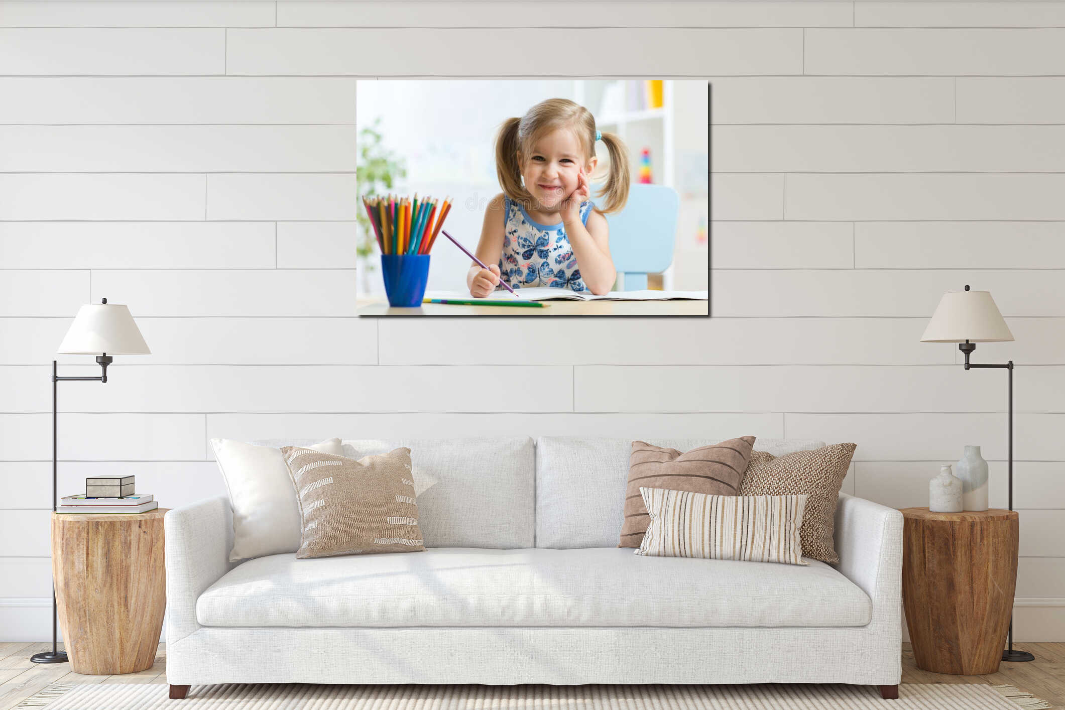 Cute happy little child girl drawing with pencils in daycare center interior mockup