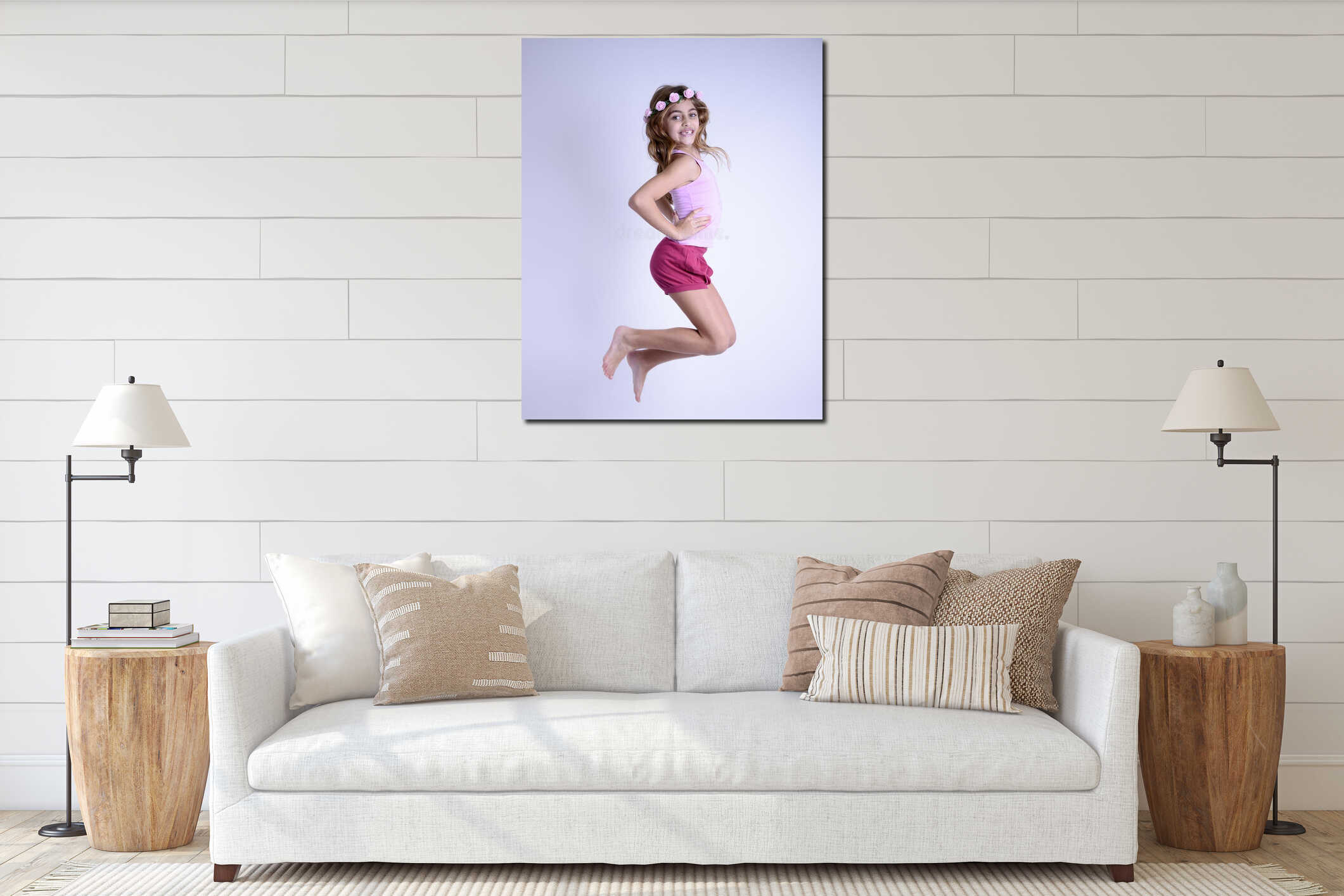 Happy jumping girl with bare feet and flowers in hair interior mockup