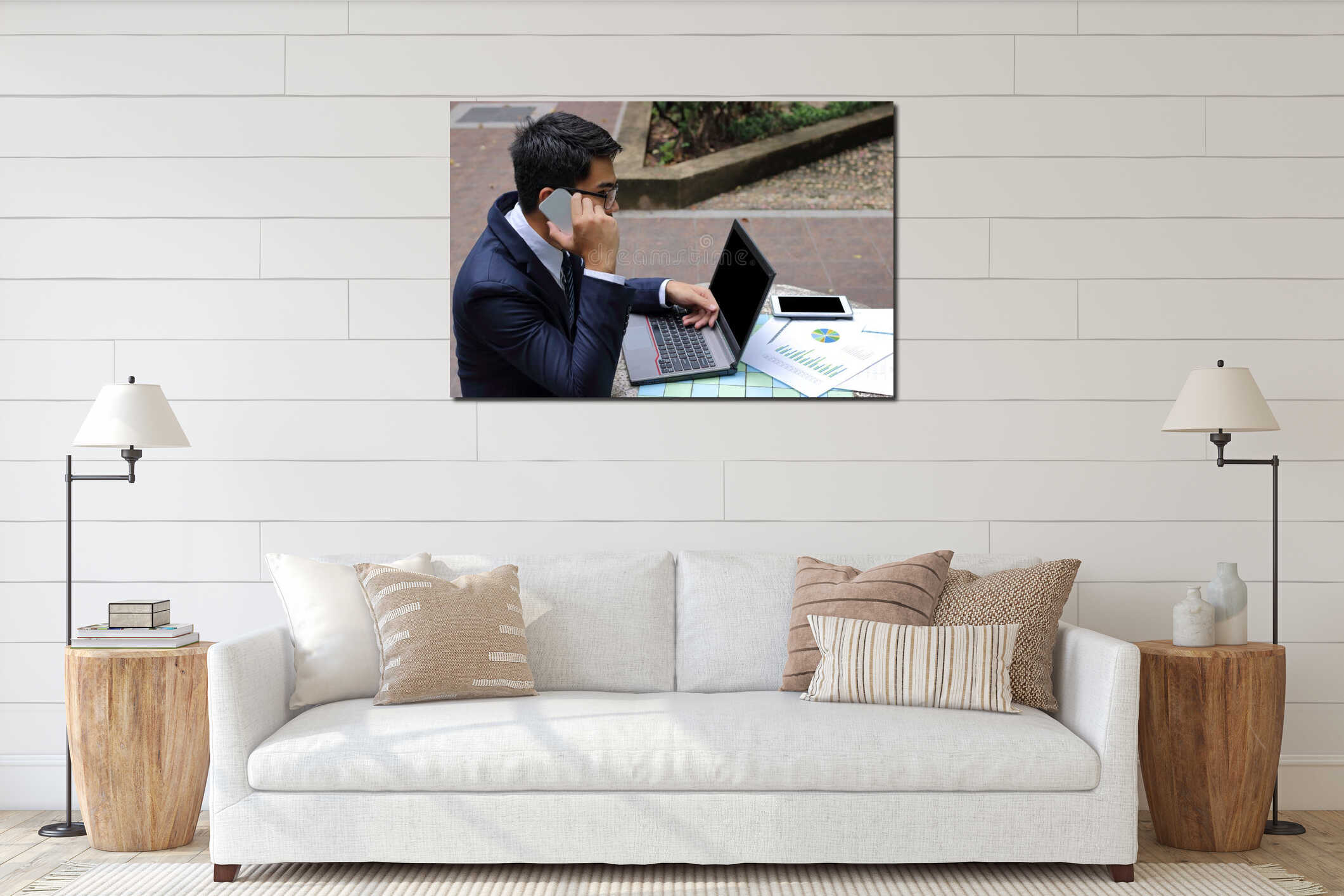 Rear view of handsome young businessman is talking on the phone for his work. interior mockup