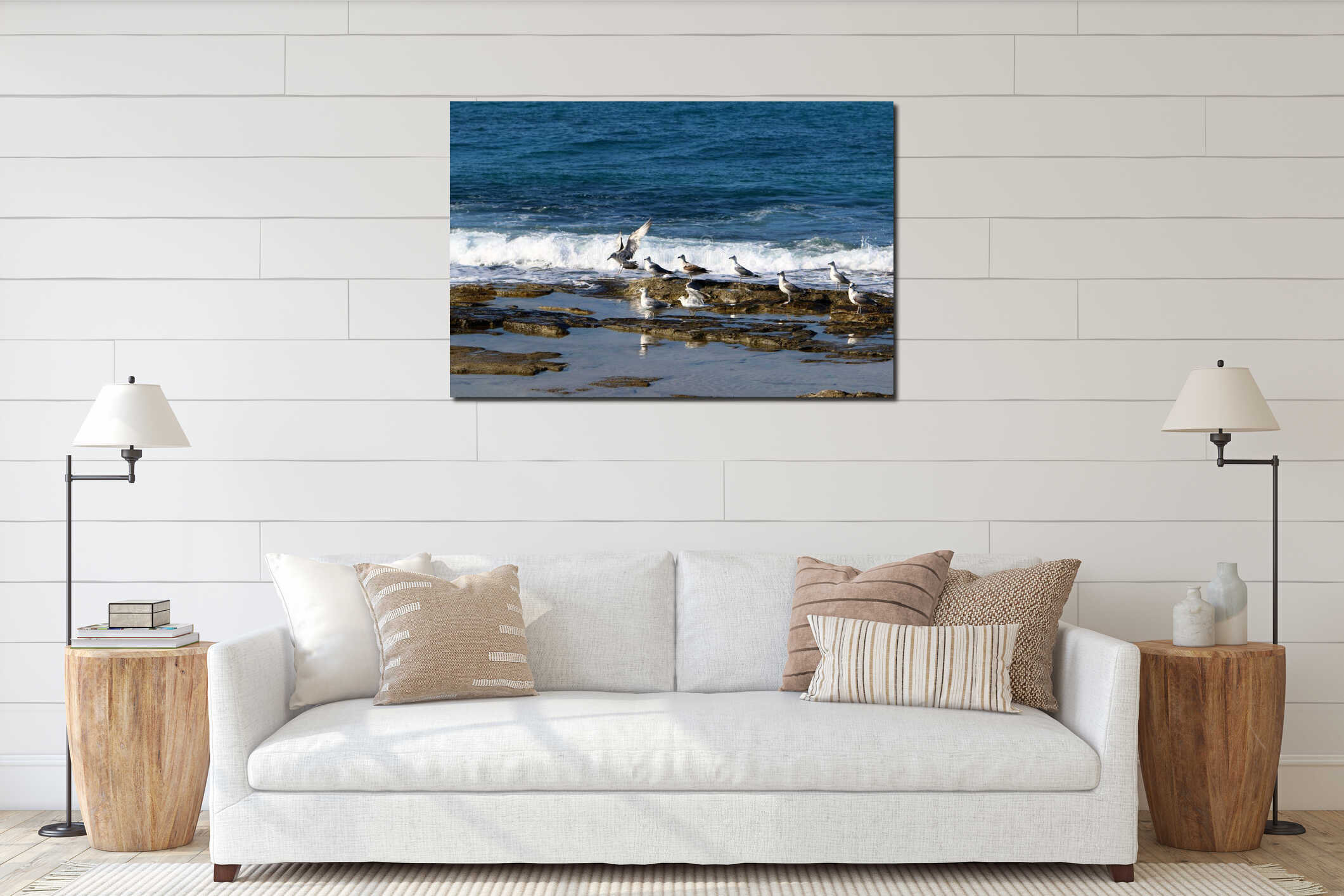 The seagull sits on the seashore interior mockup