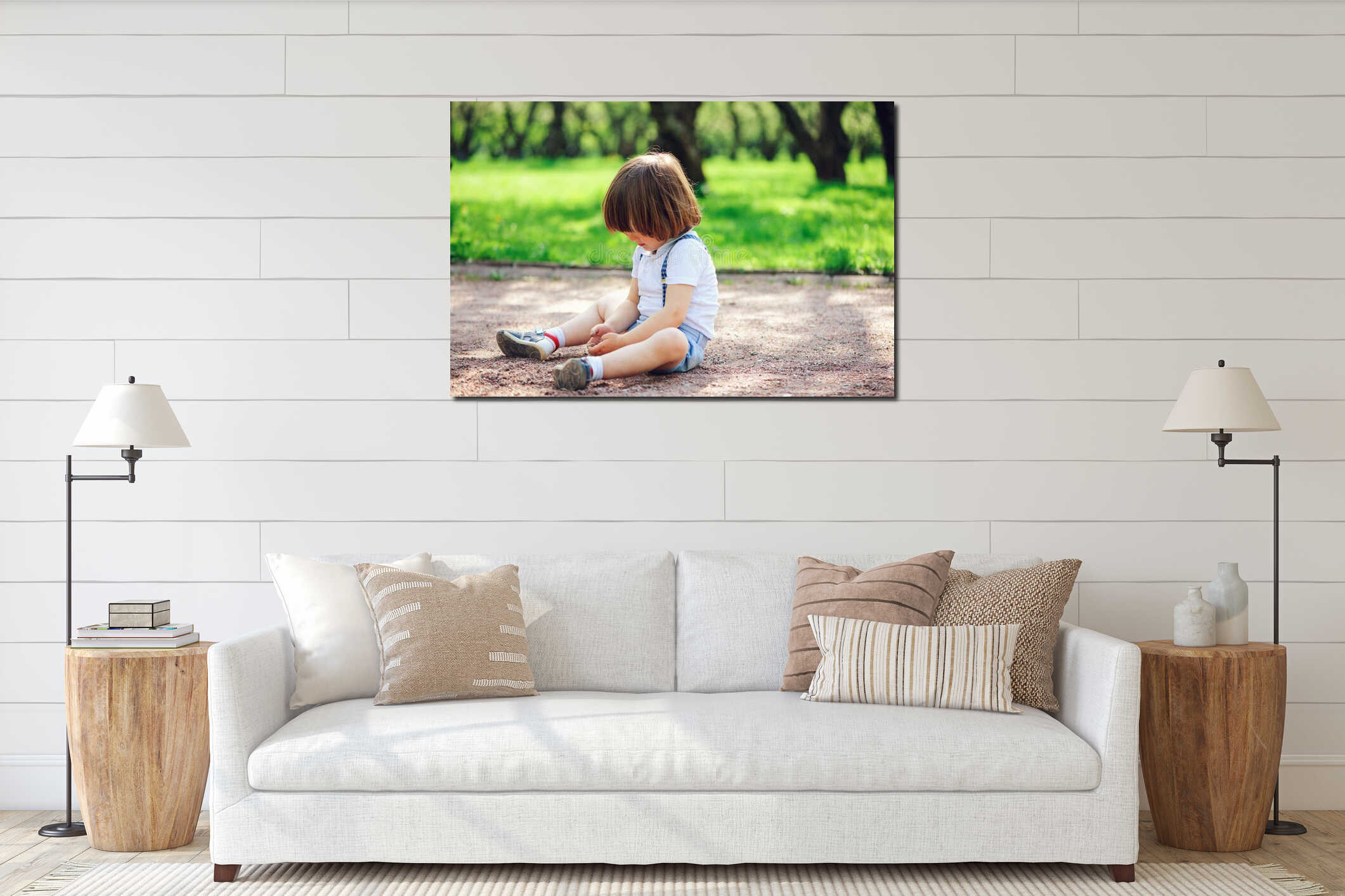 Cute little toddler child boy playing with dirt and sitting on the ground interior mockup