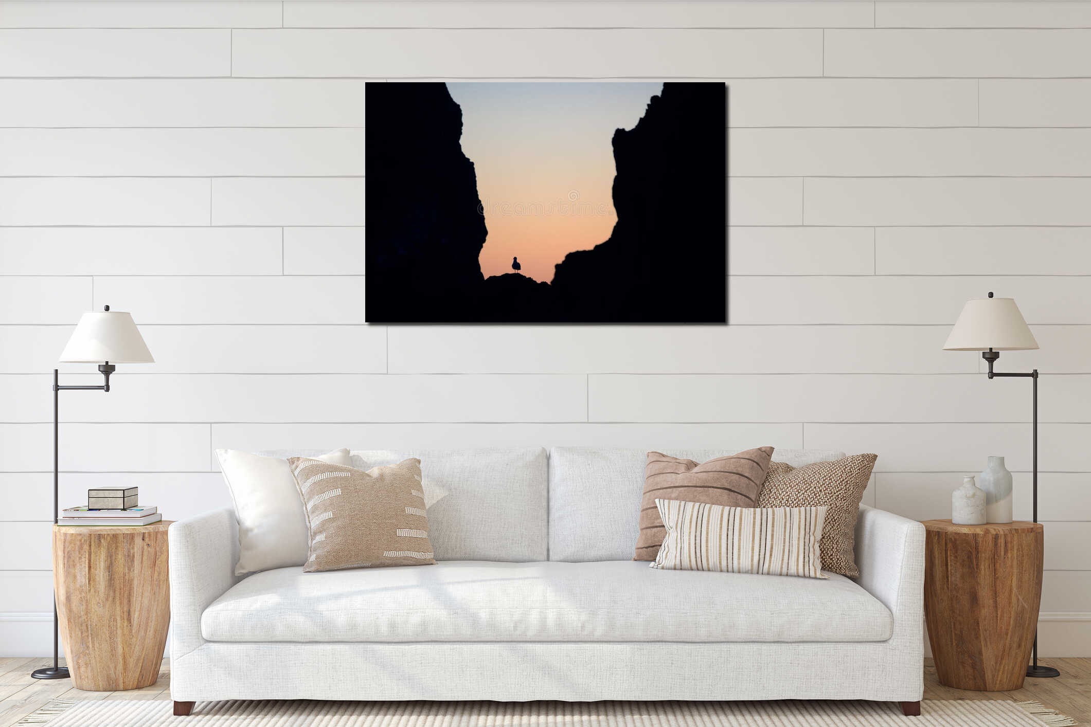 Black silhouette of seagull on the rocks interior mockup