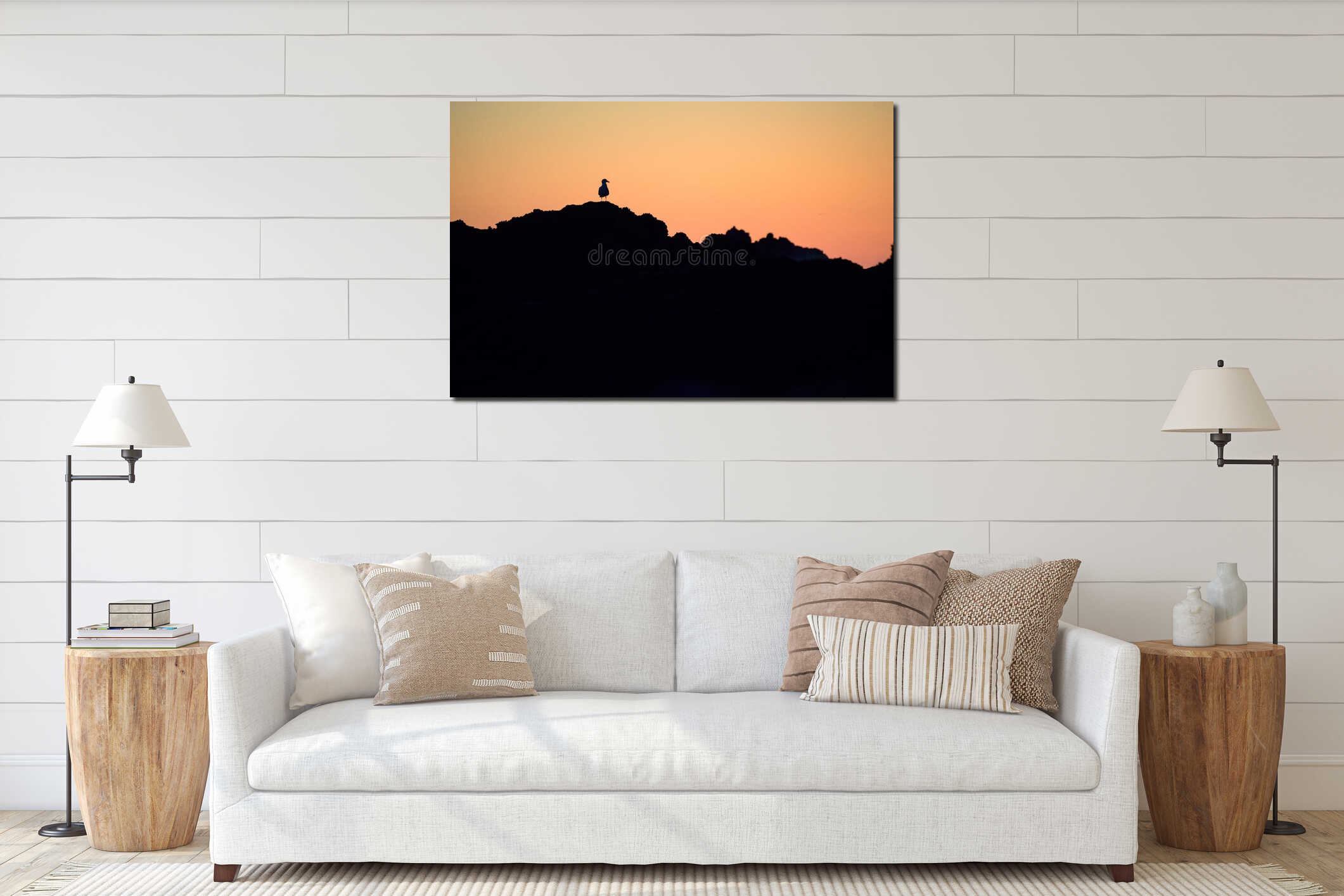 Black silhouette of seagull on the rocks interior mockup