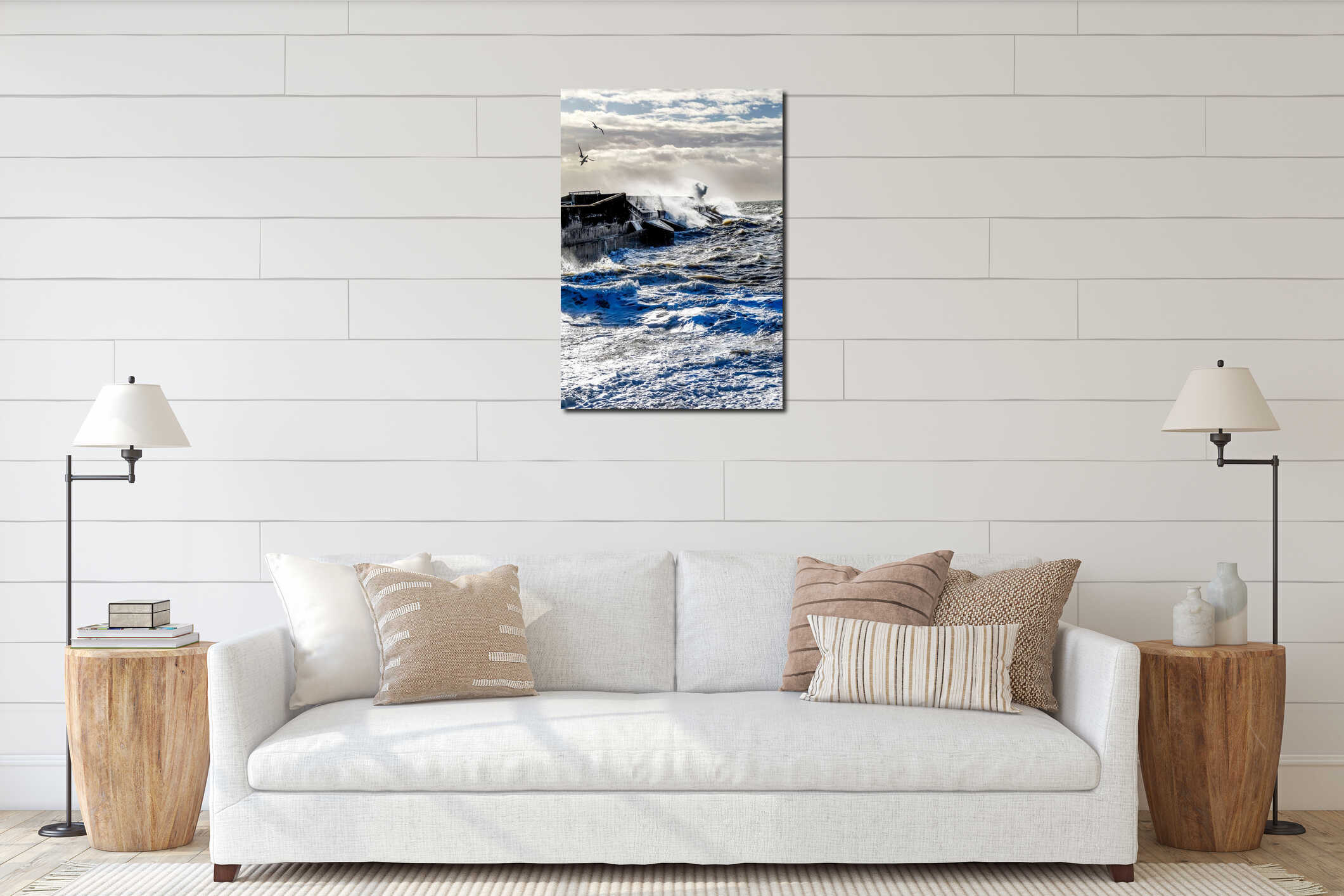 rough seas crashing against Brighton marina habour wall, a solitary seagull flying against the wind interior mockup