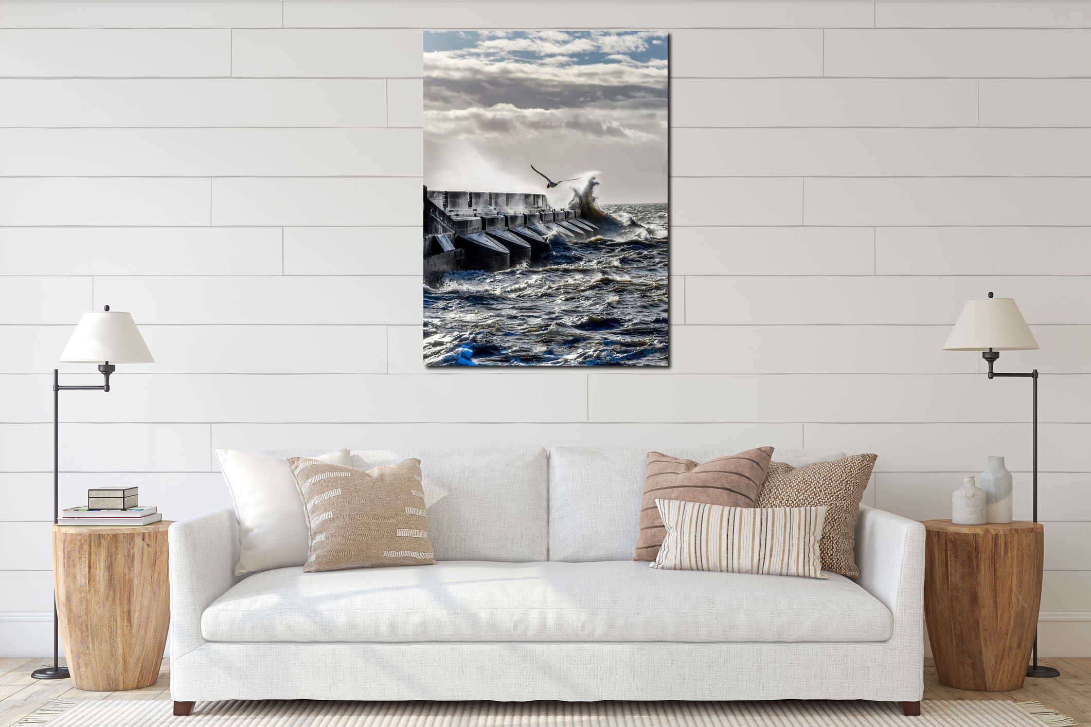 rough seas crashing against Brighton marina habour wall, a solitary seagull flying against the wind interior mockup