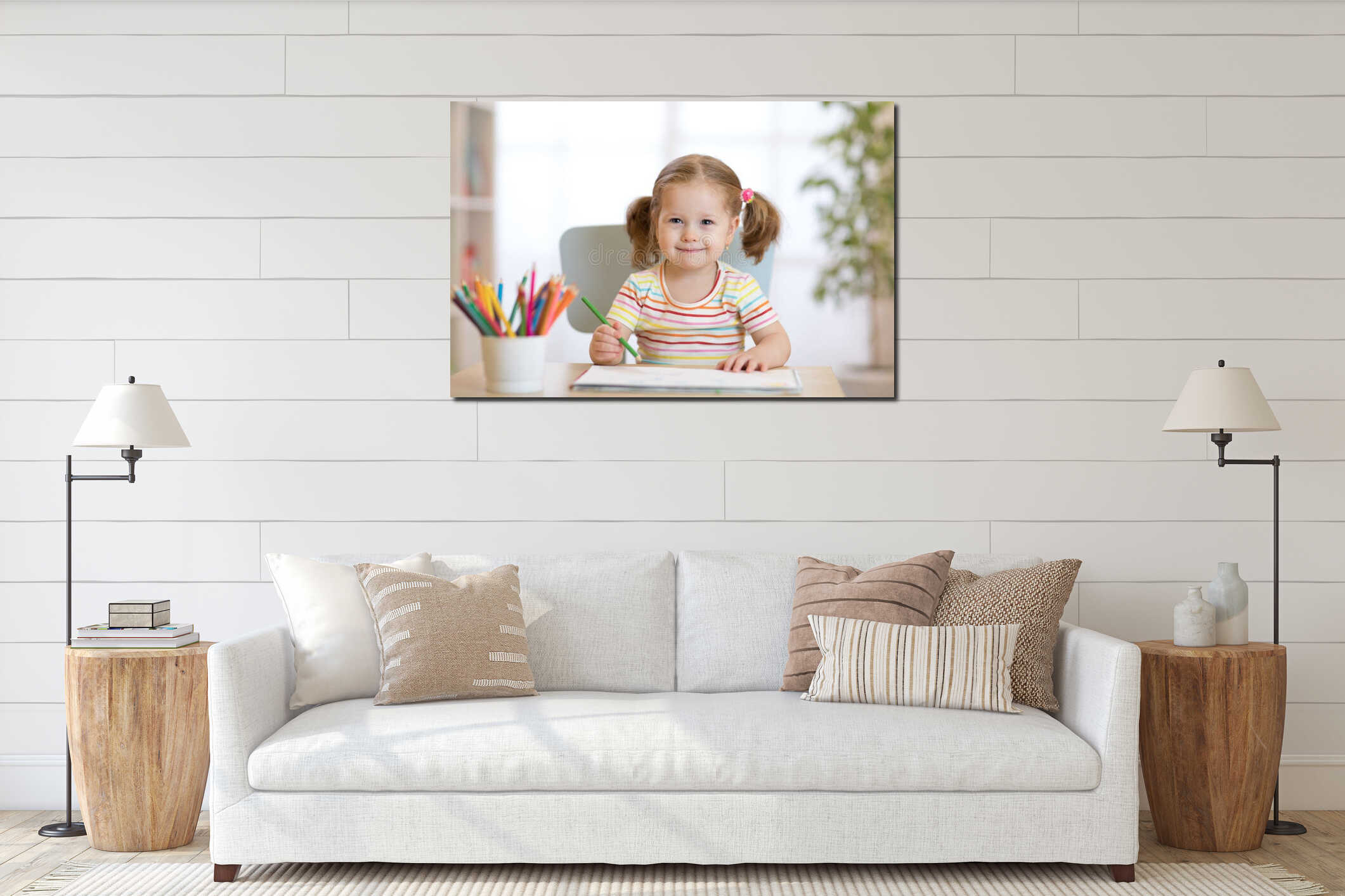 Cute happy little child girl drawing with pencils in daycare center interior mockup