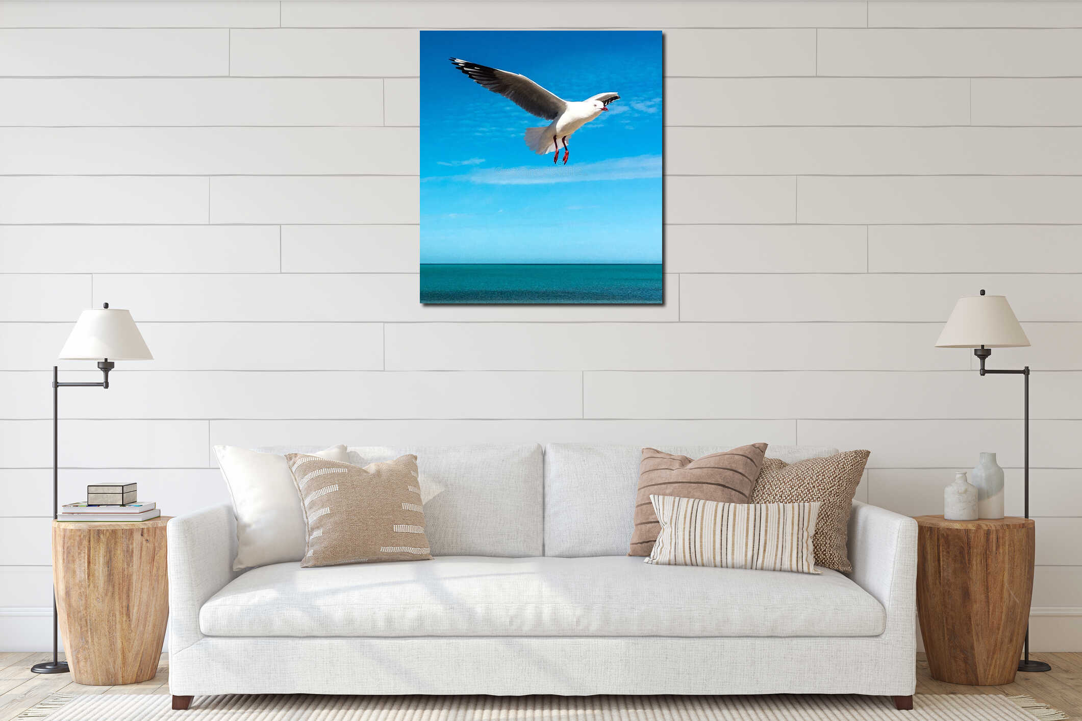 Seagull flying over ocean interior mockup