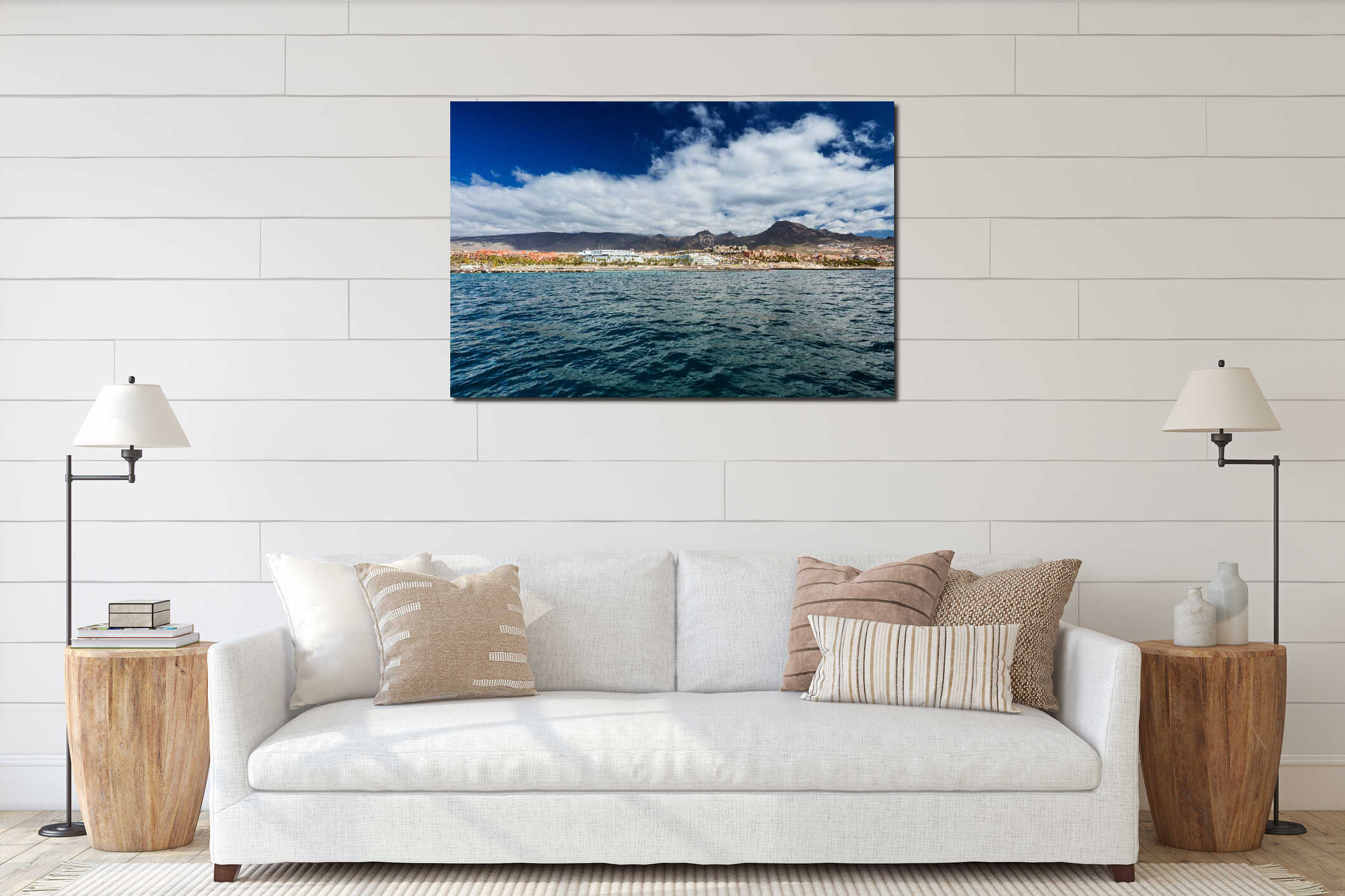 Vibrant scenery and deep-blue waters of the Tenerife west coastline as seen from a yacht. The dormant Teide volcano can be seen in interior mockup