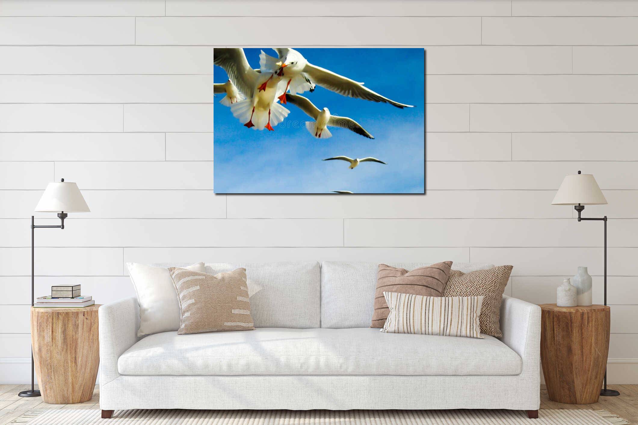 The seagulls flying in the sky and fighting for meal with light interior mockup