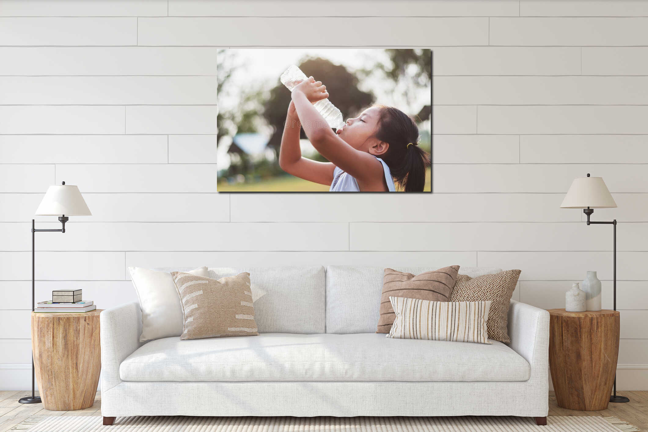 asian little girl drinking fresh water from plastic bottle with interior mockup