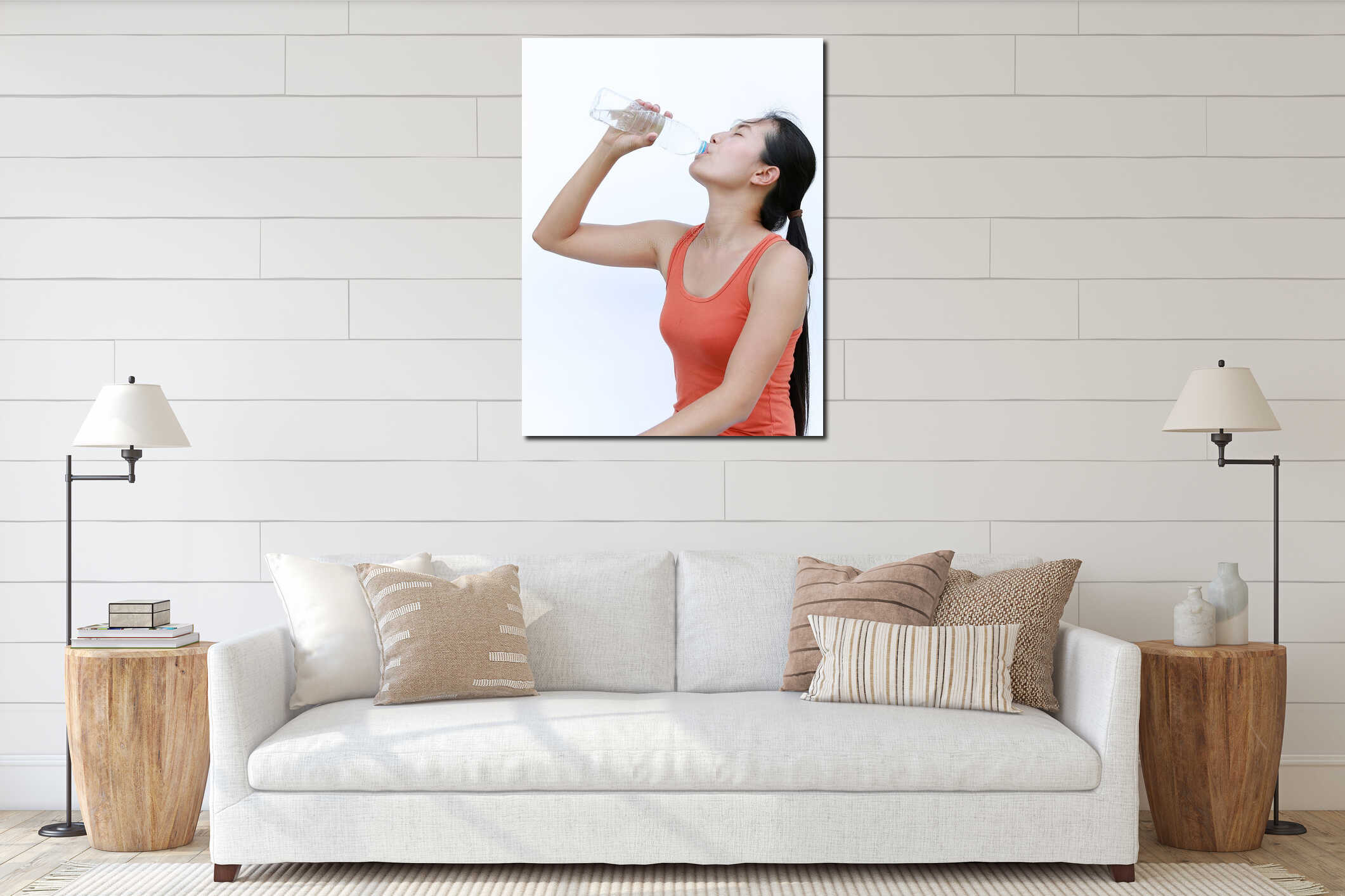 Thirsty fitness girl drinking bottle of water interior mockup
