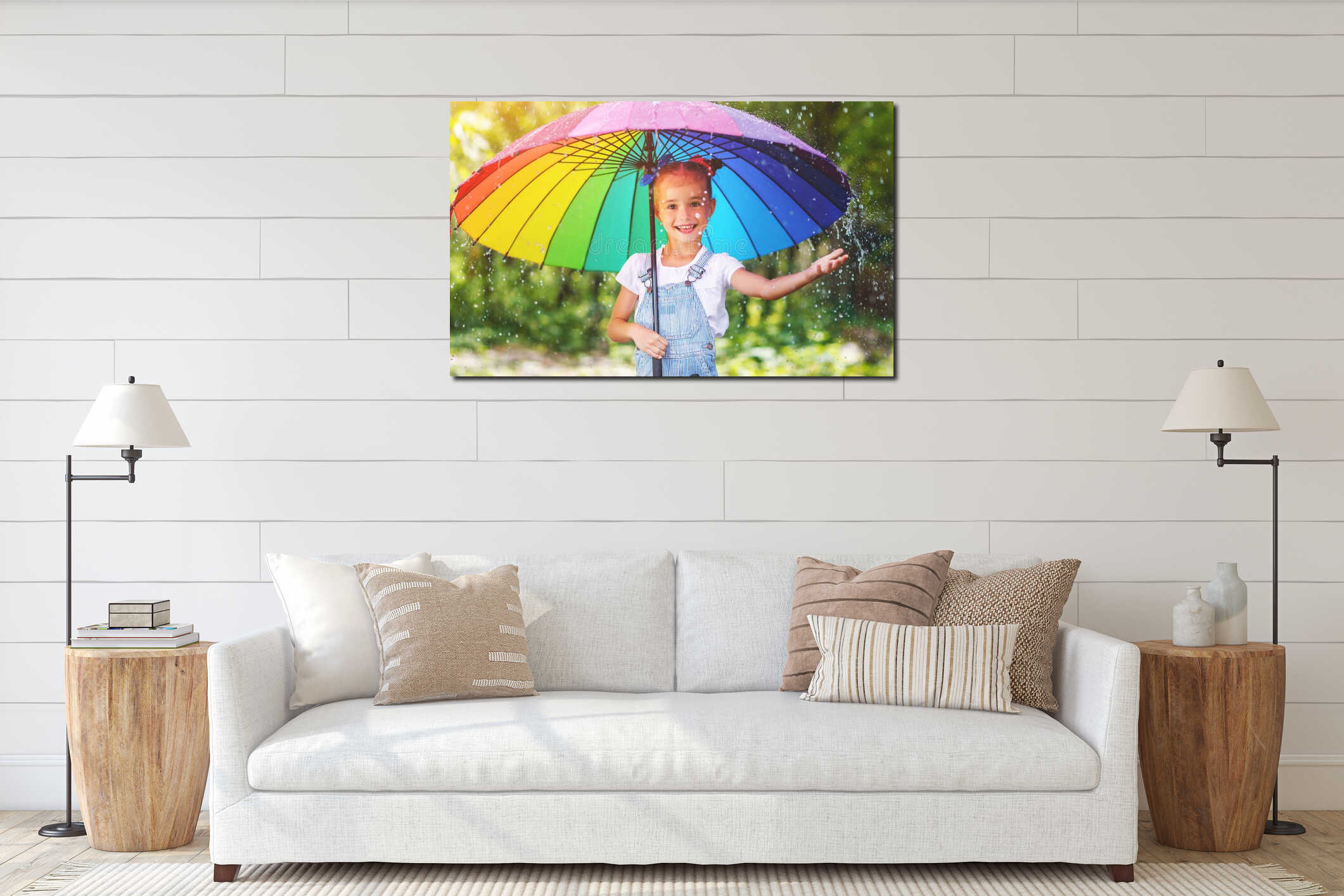 Happy child girl laughs and plays under summer rain with an umbrella. interior mockup