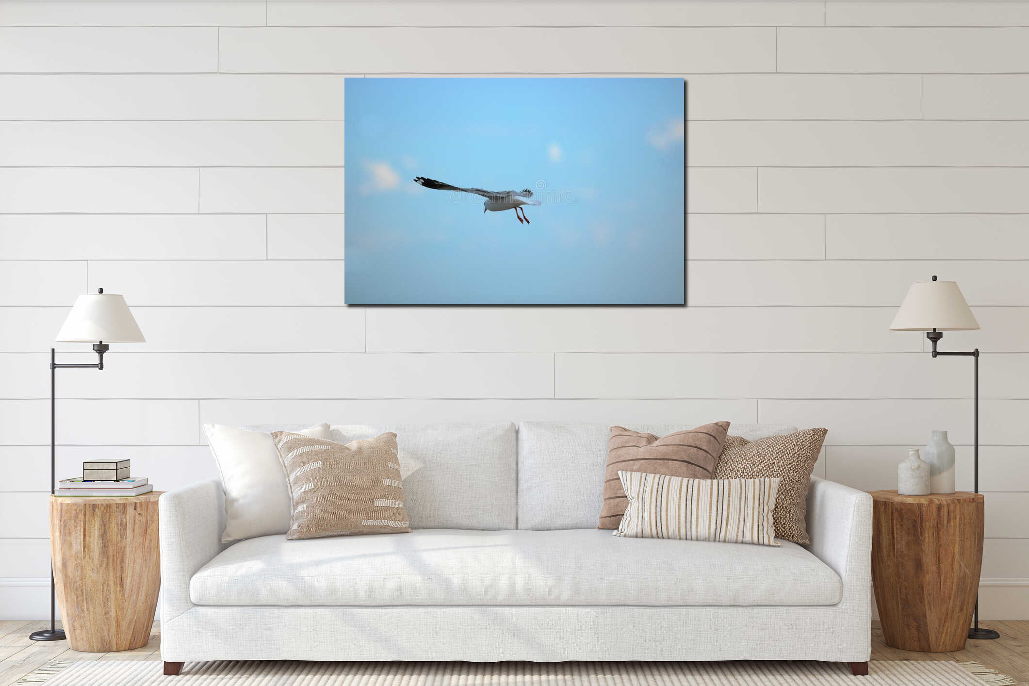 White seagull flying in the sky. Selective focus and shallow depth of field. interior mockup