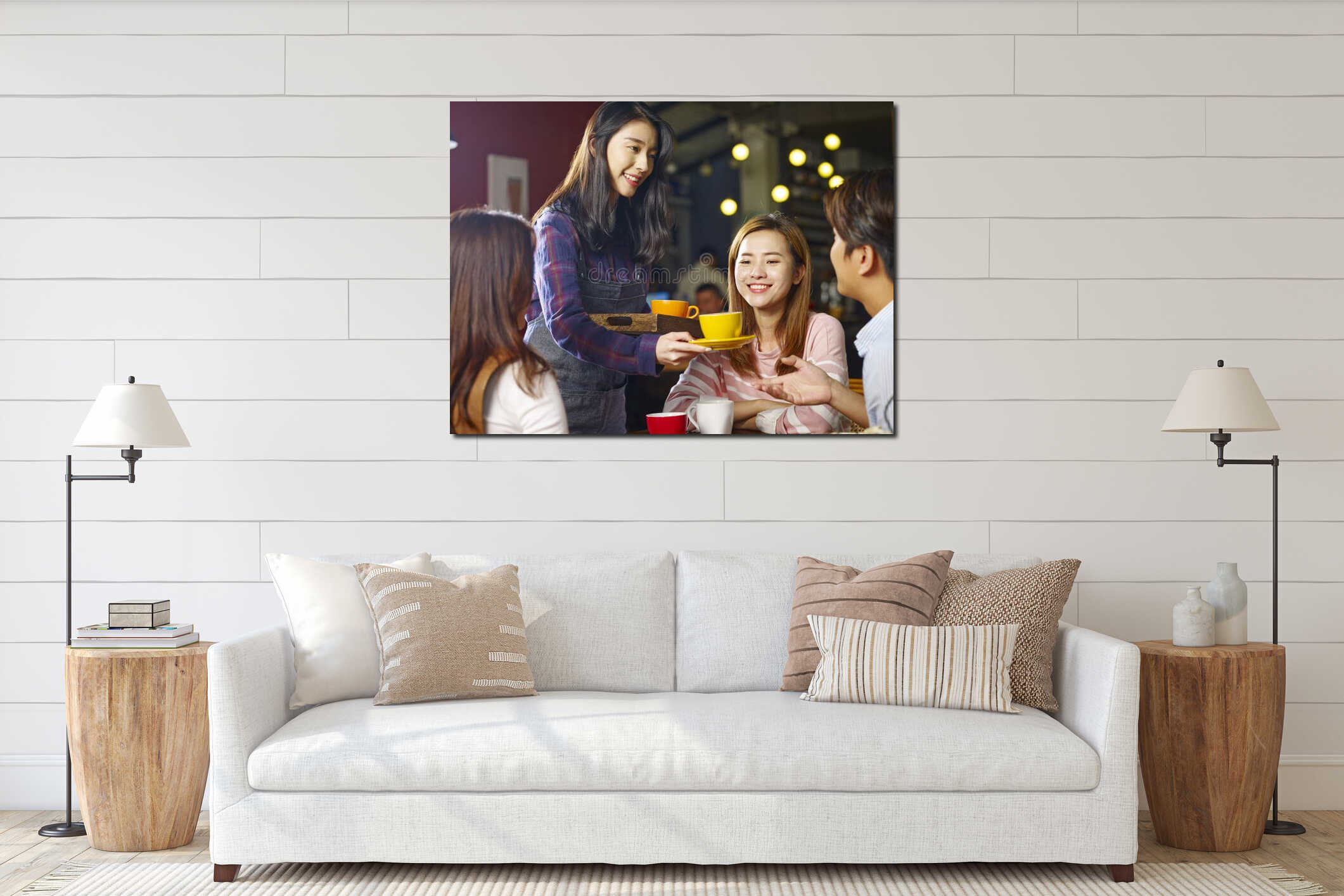 Young smiling asian waitress serving coffee to customers interior mockup