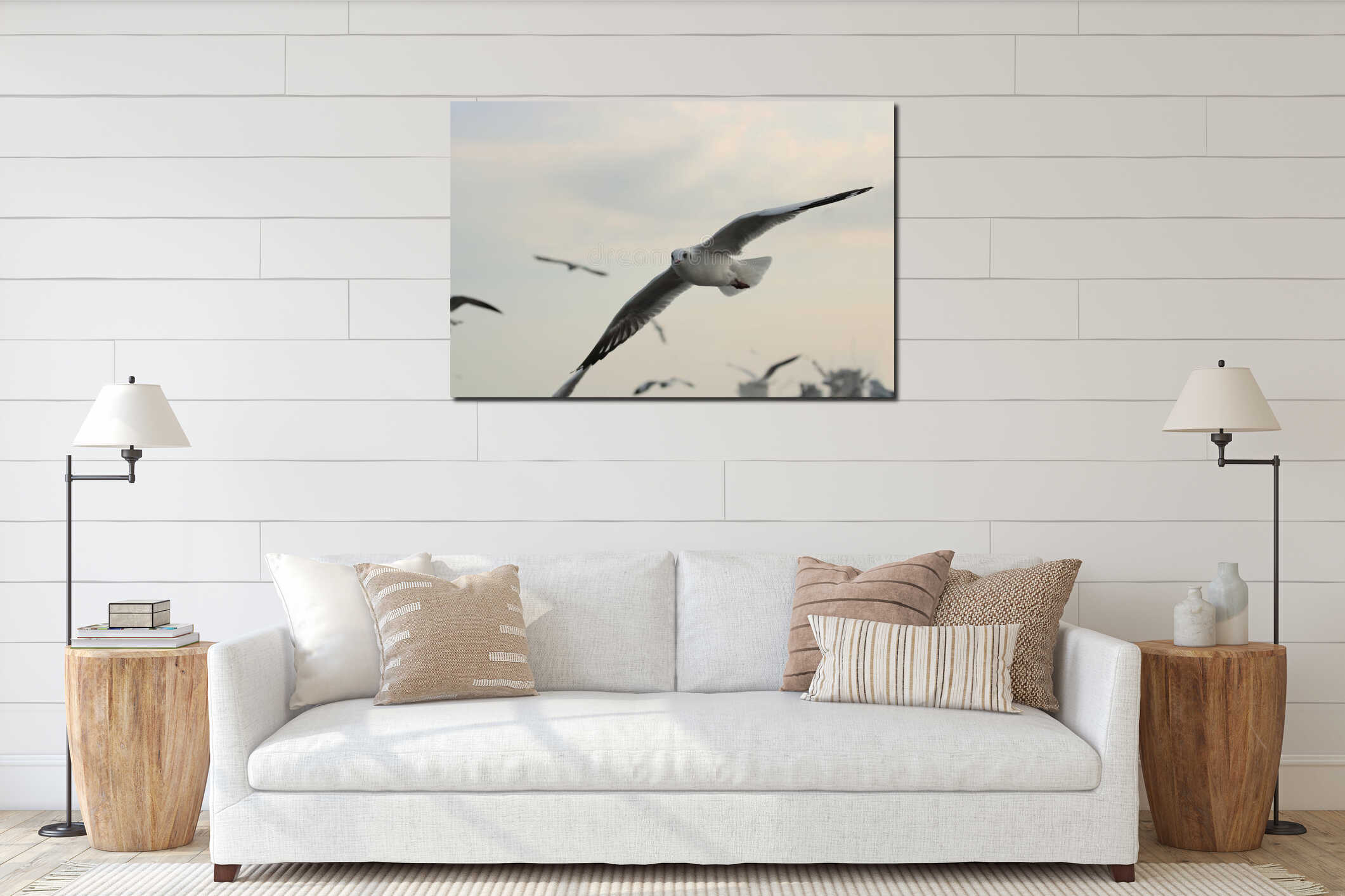 White seagull flying in the sky. Selective focus and shallow depth of field. interior mockup