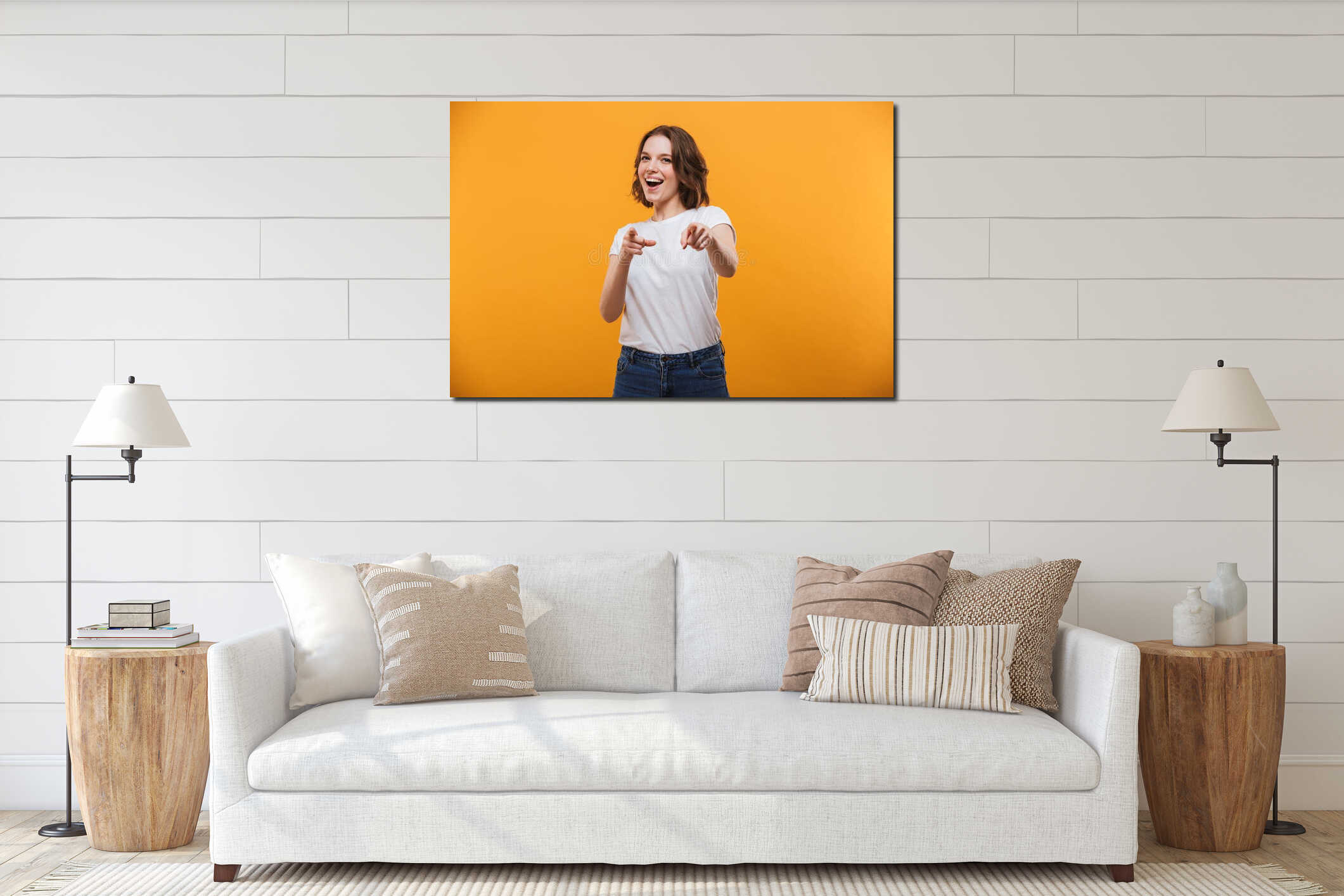 Happy emotional young woman pointing to you. interior mockup