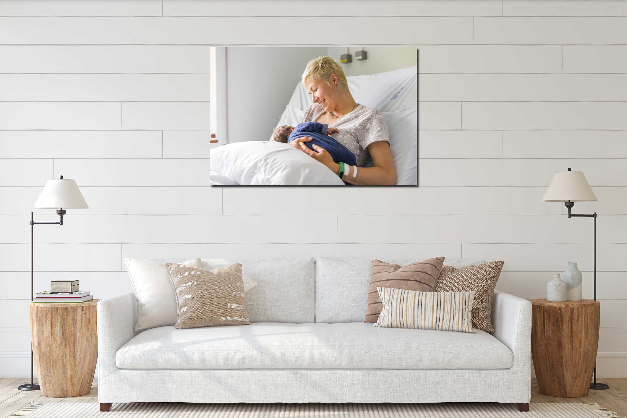 Mom breastfeeding her newborn baby boy in a hospital interior mockup