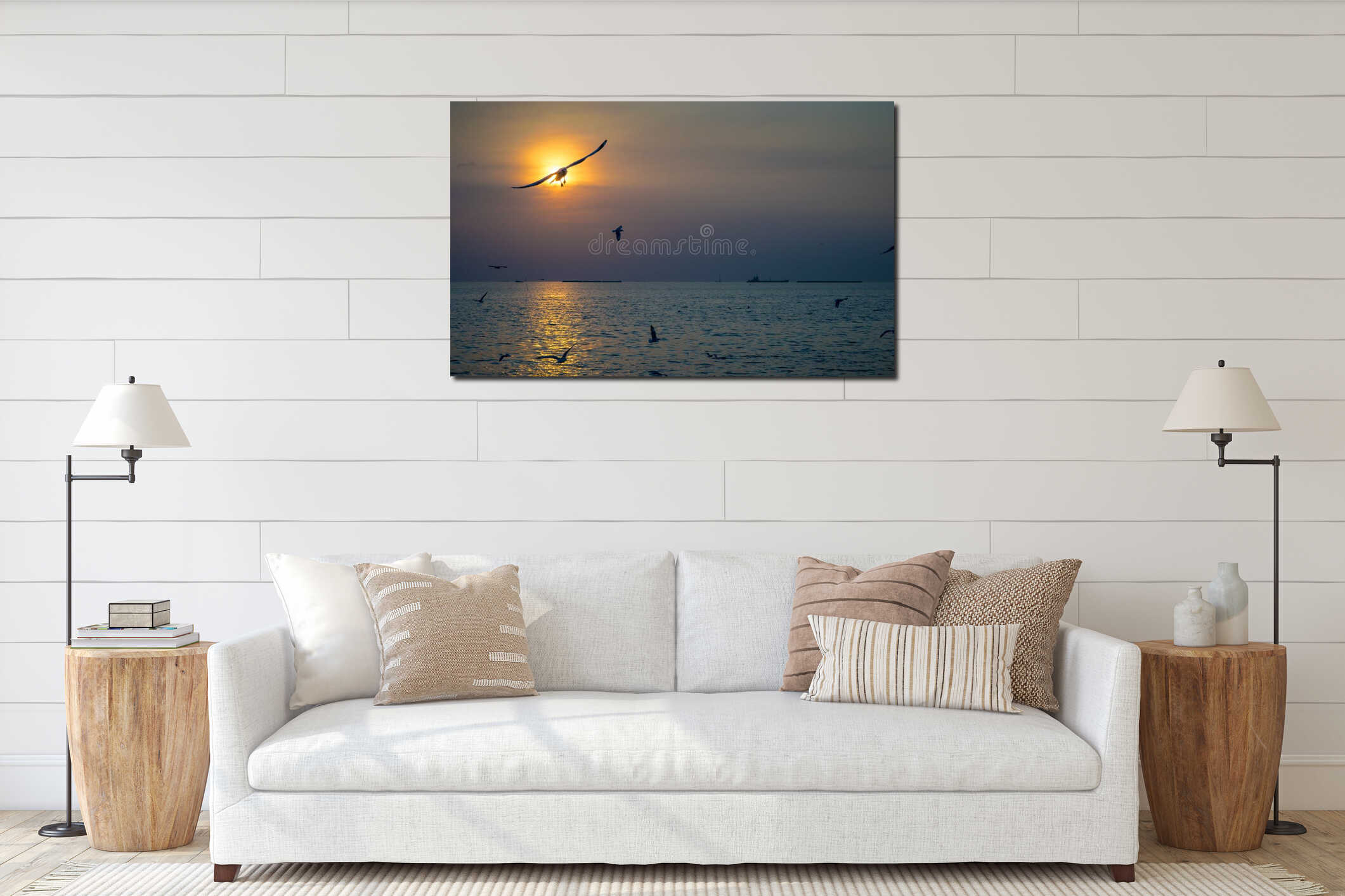 Seagull birds flying in the sky with sunset over the sea interior mockup