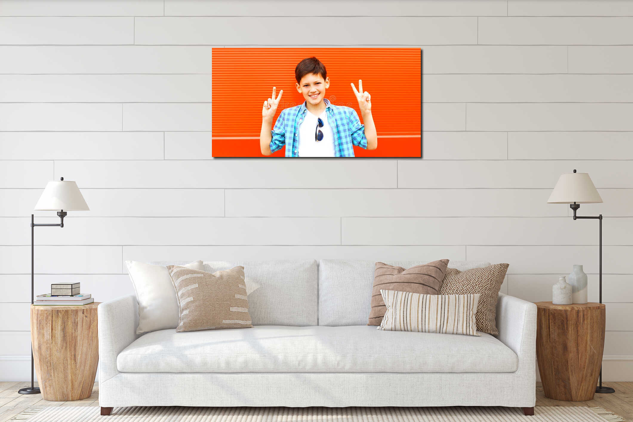 closeup portrait teenager boy is having fun on a colorful orange interior mockup