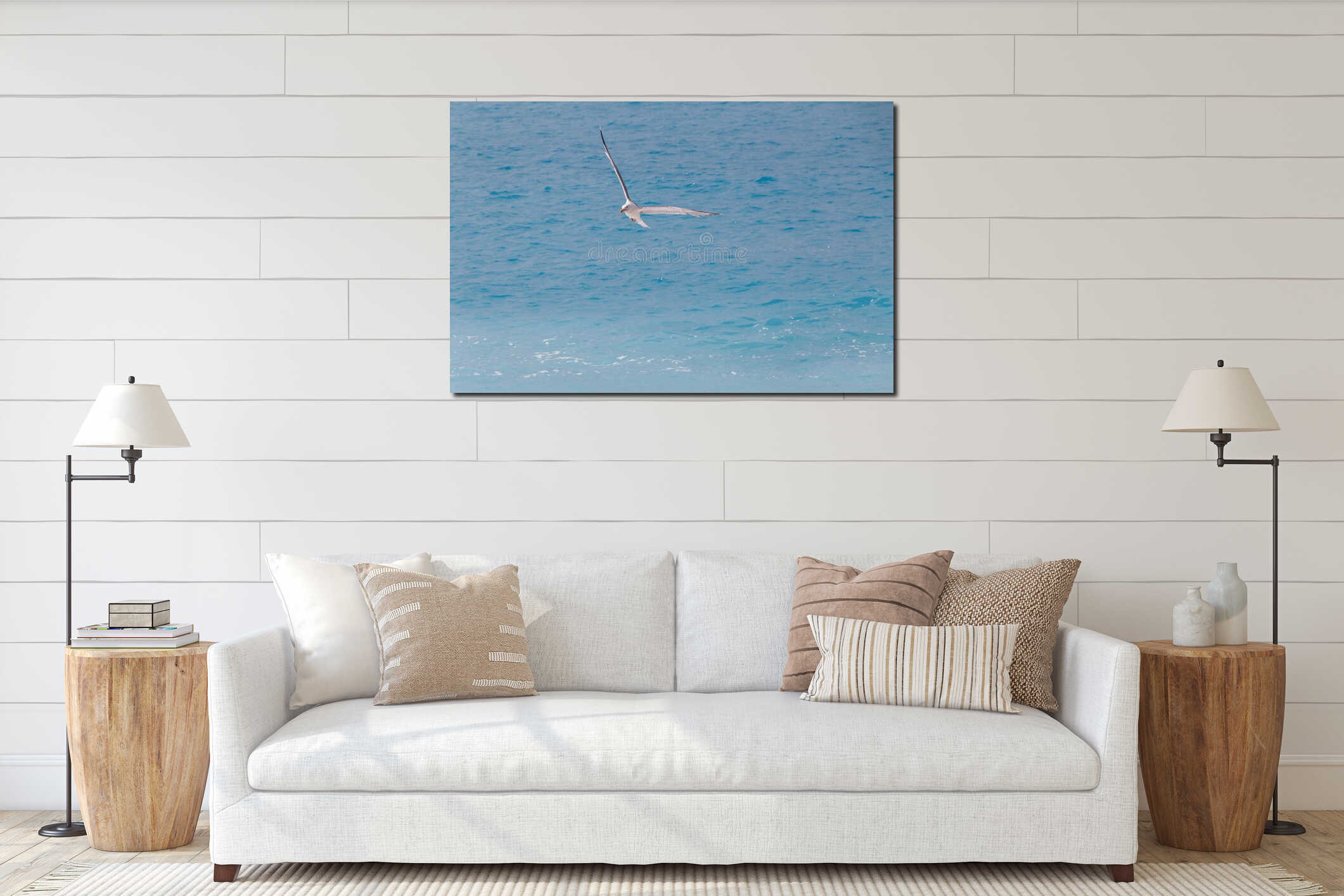 Seagull flying above azure sea interior mockup
