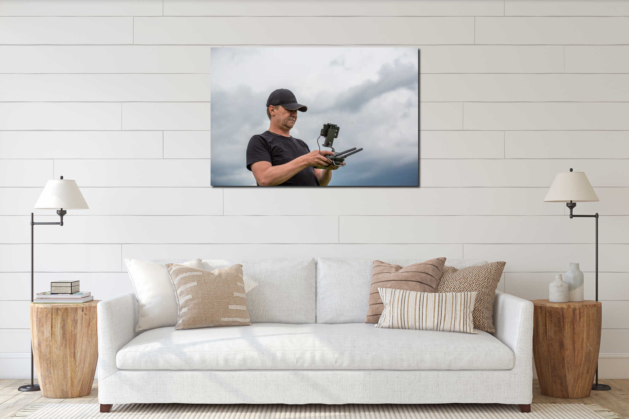 Man controls a quadrocopter. Selective focus on men, drone is blurred interior mockup