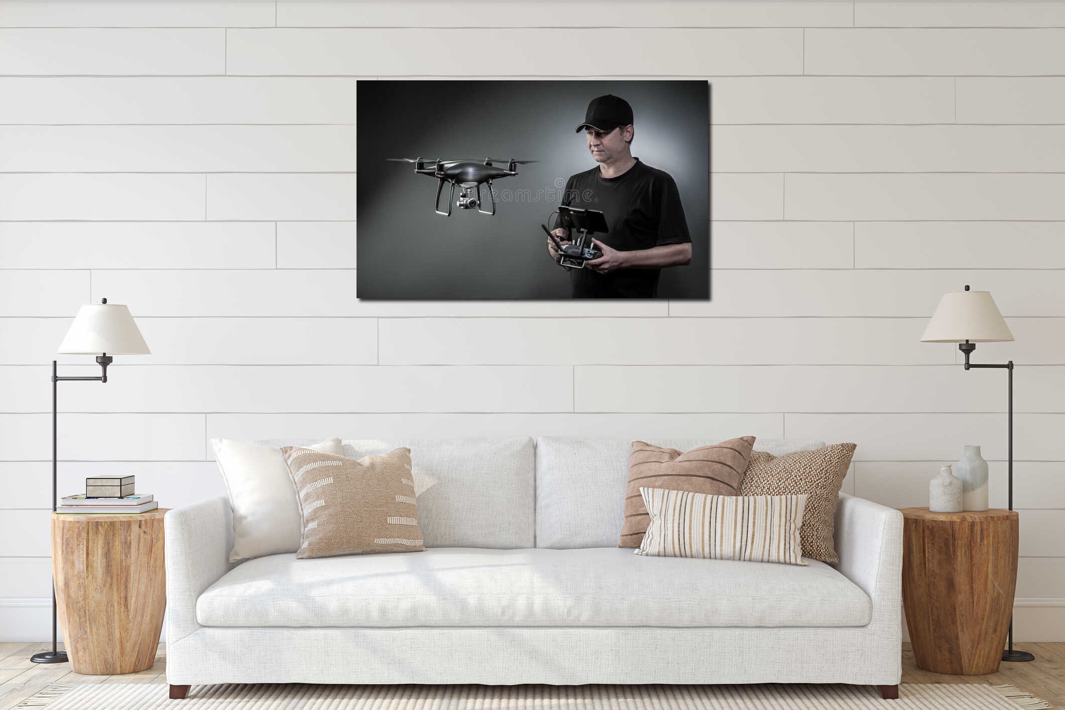 Man controls a quadrocopter. Selective focus on men, drone is blurred interior mockup
