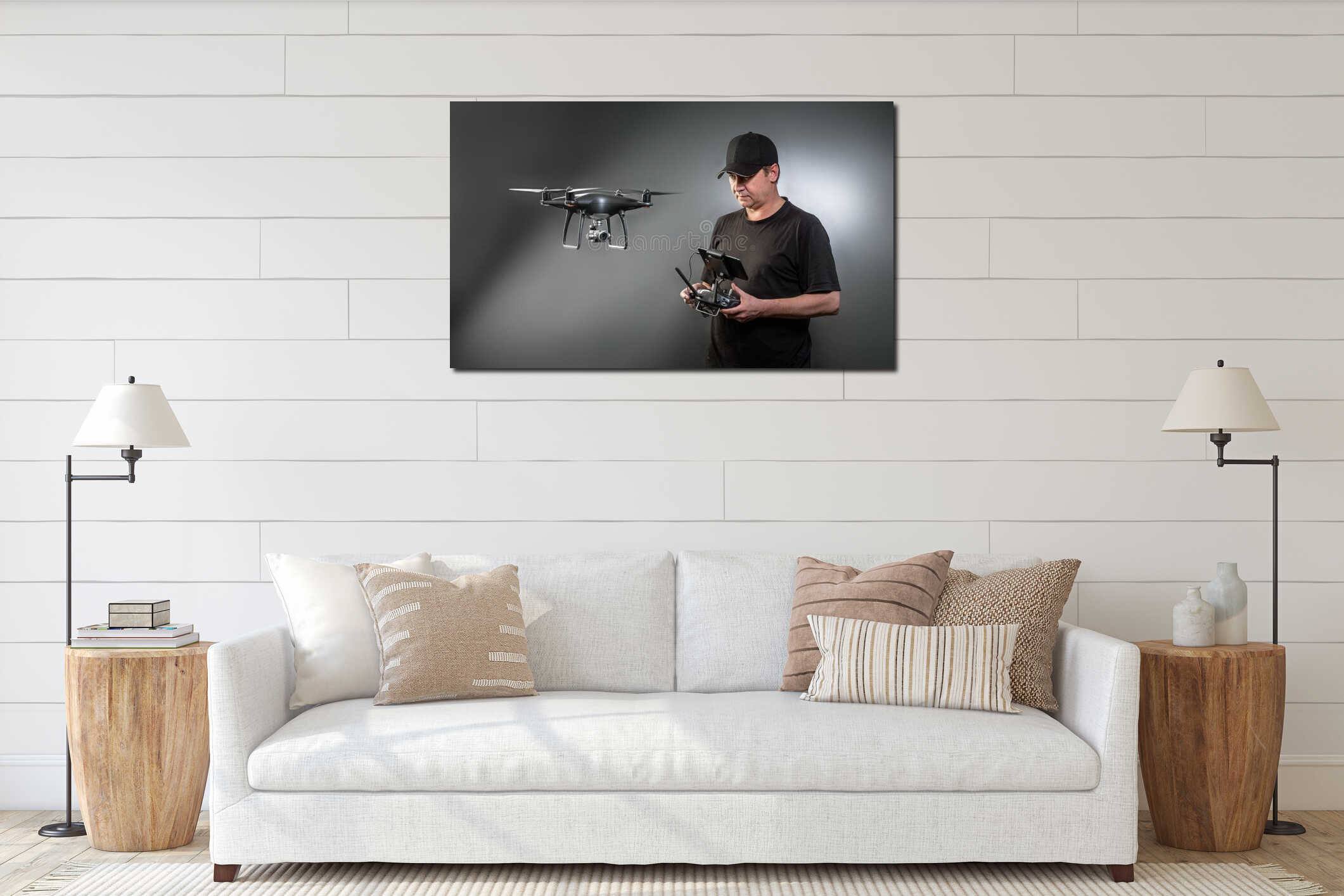 Man controls a quadrocopter. Selective focus on men, drone is blurred interior mockup