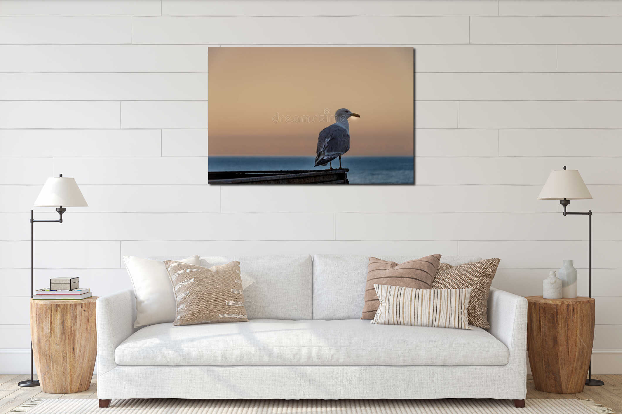 Seagull watching at sunset on the sea interior mockup