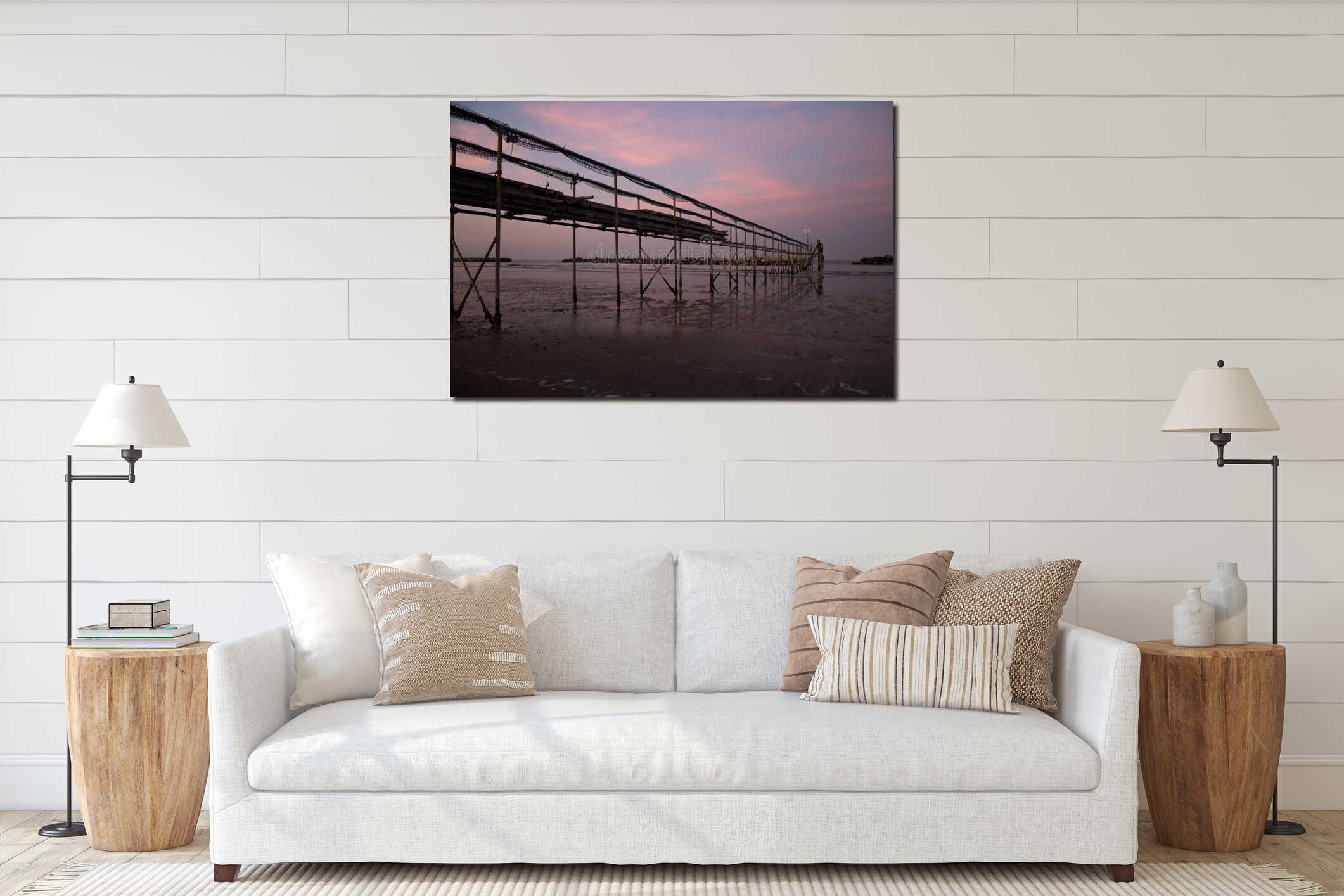Peaceful evening on the shore, with scenic pink sunset reflected on water ant metallic pier; adriatic sea interior mockup