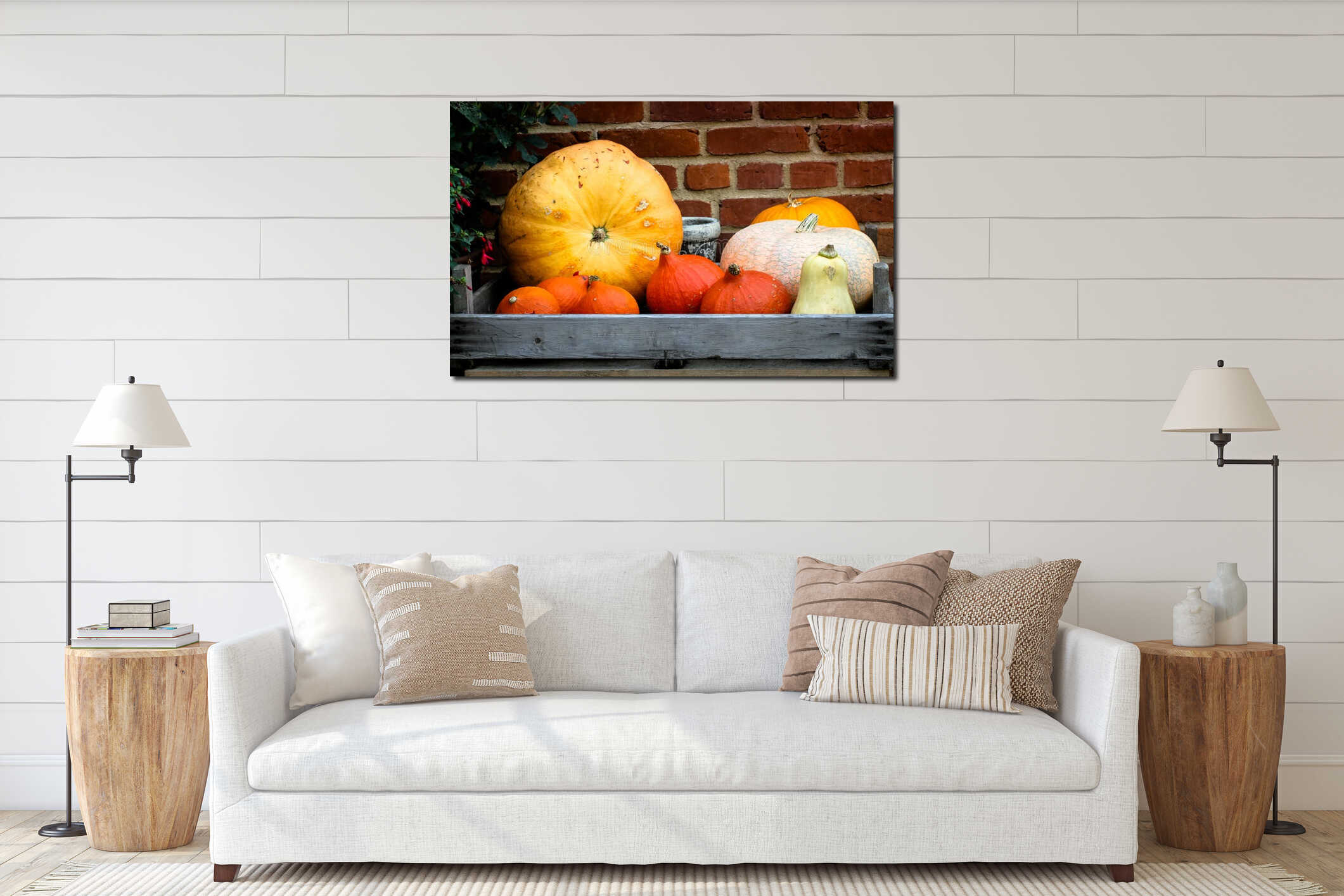 Fresh pumpkins and squashes inside wooden crate against a farm barn red brick wall background interior mockup