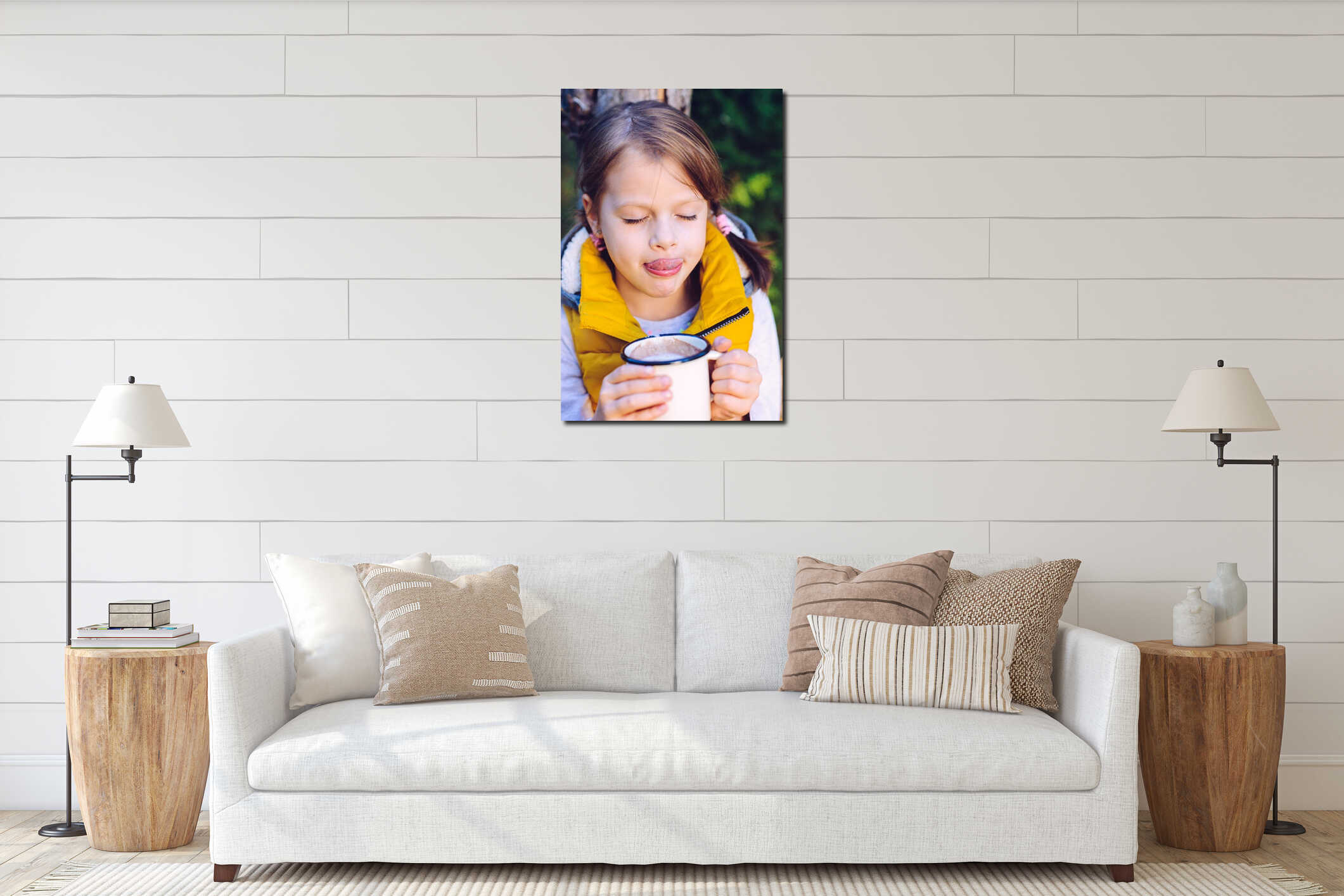 child girl drinking chocolate from a cup dressed in a warm yellow vest in autumn scenery interior mockup