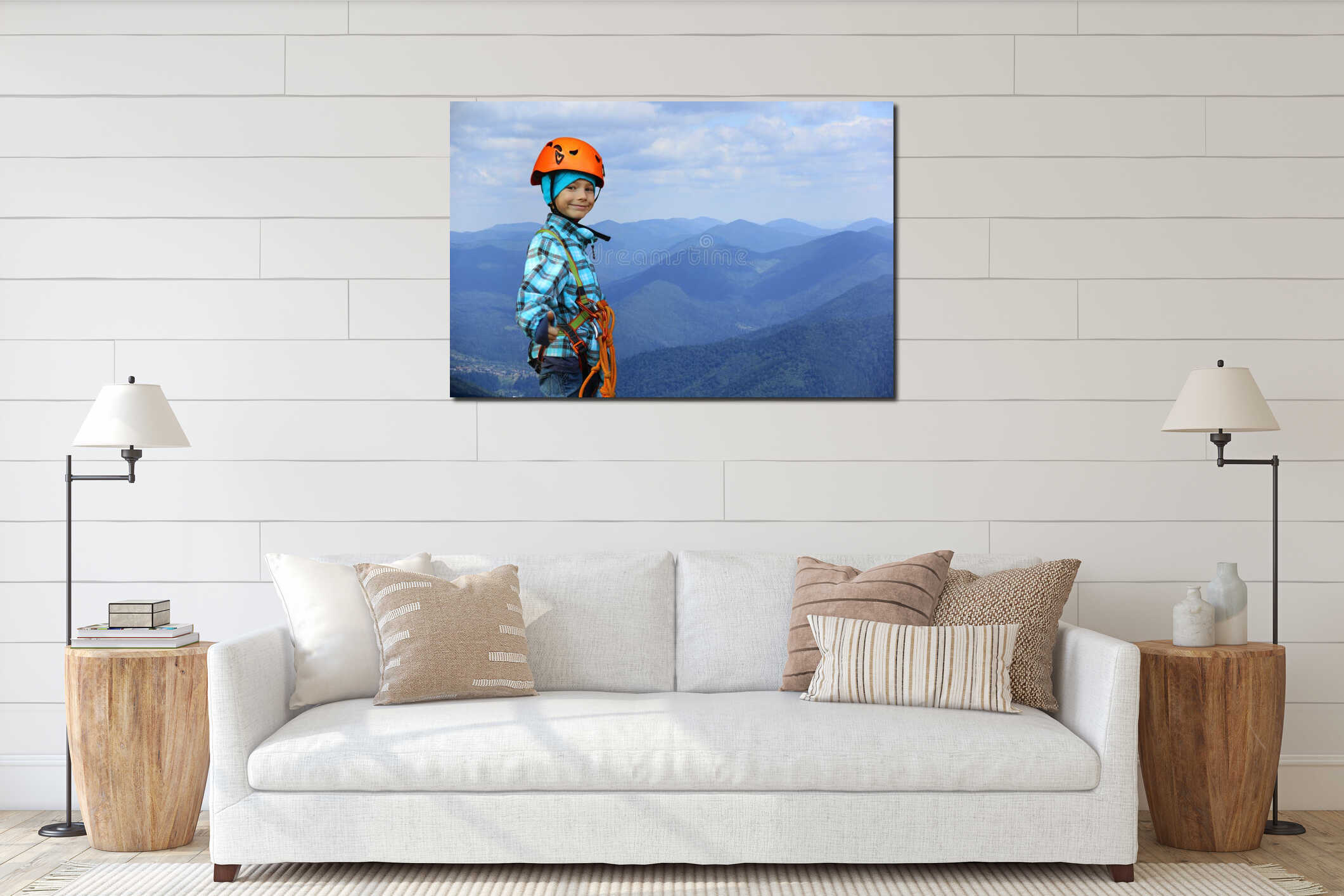 Portrait of a smiling six year old boy wearing helmet and climbing safety harness in mountains interior mockup