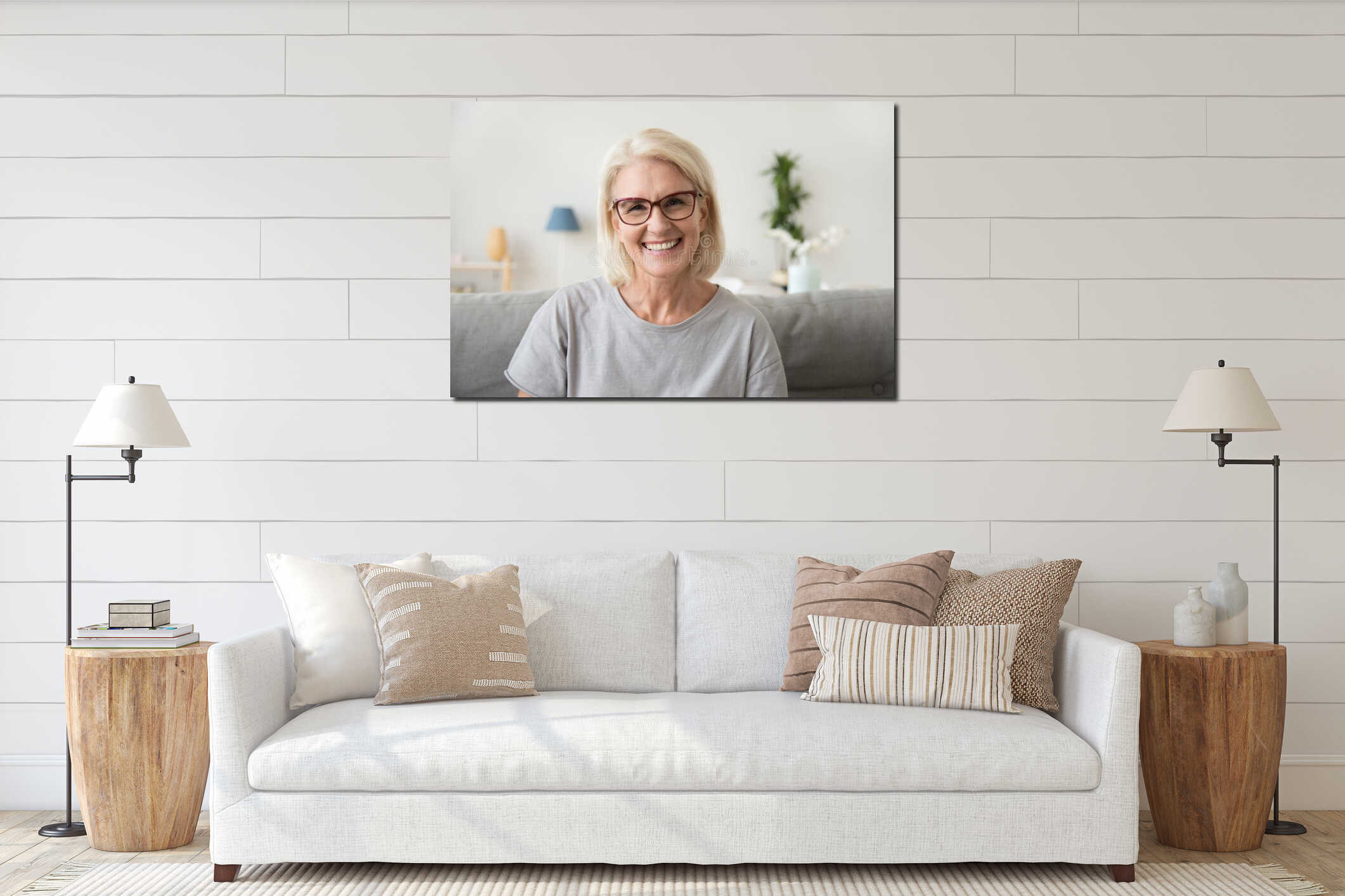 Smiling middle aged mature grey haired woman looking at camera interior mockup