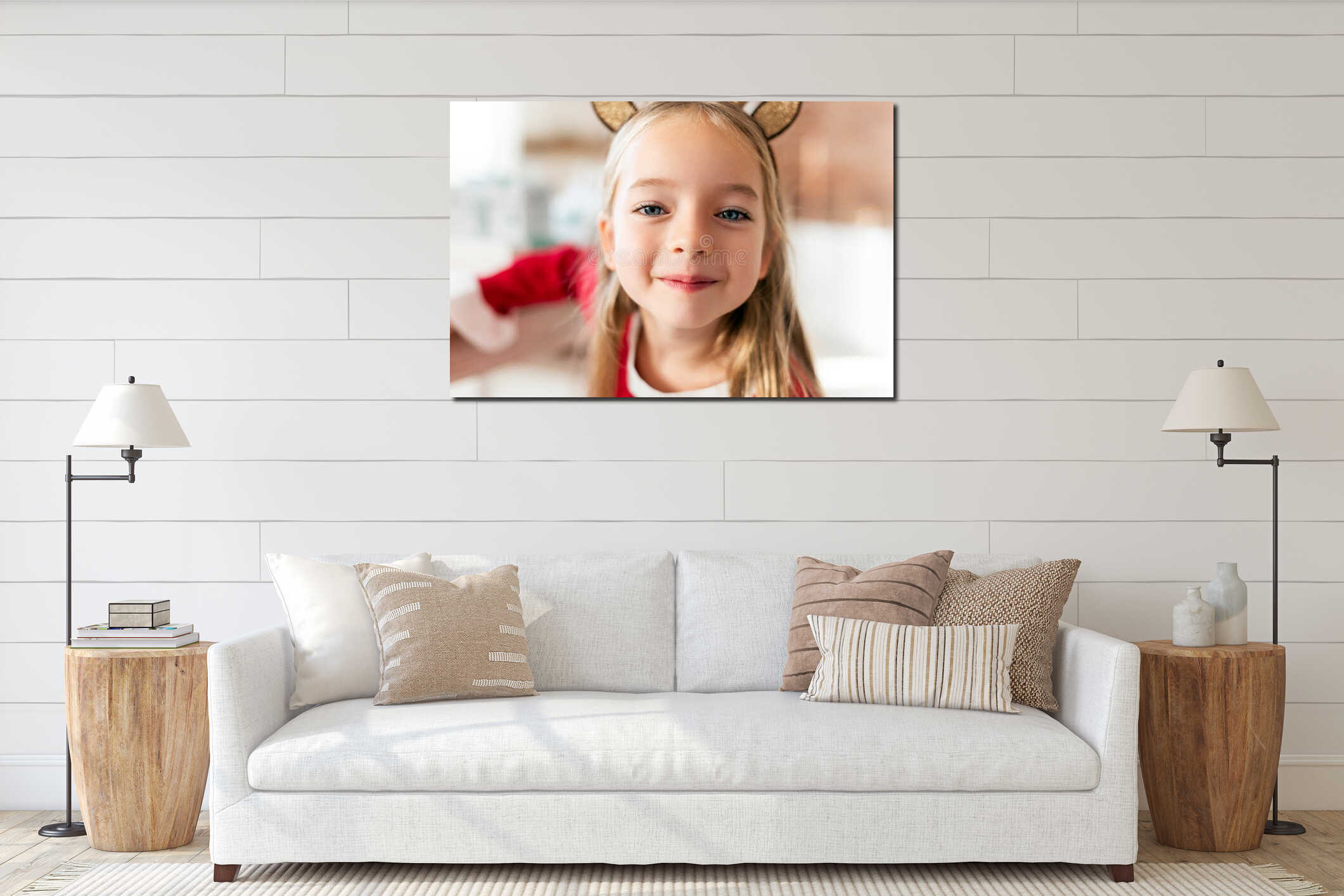 Cute young girl wearing costume reindeer antlers, smiling and looking at camera. Happy kid at christmas. interior mockup