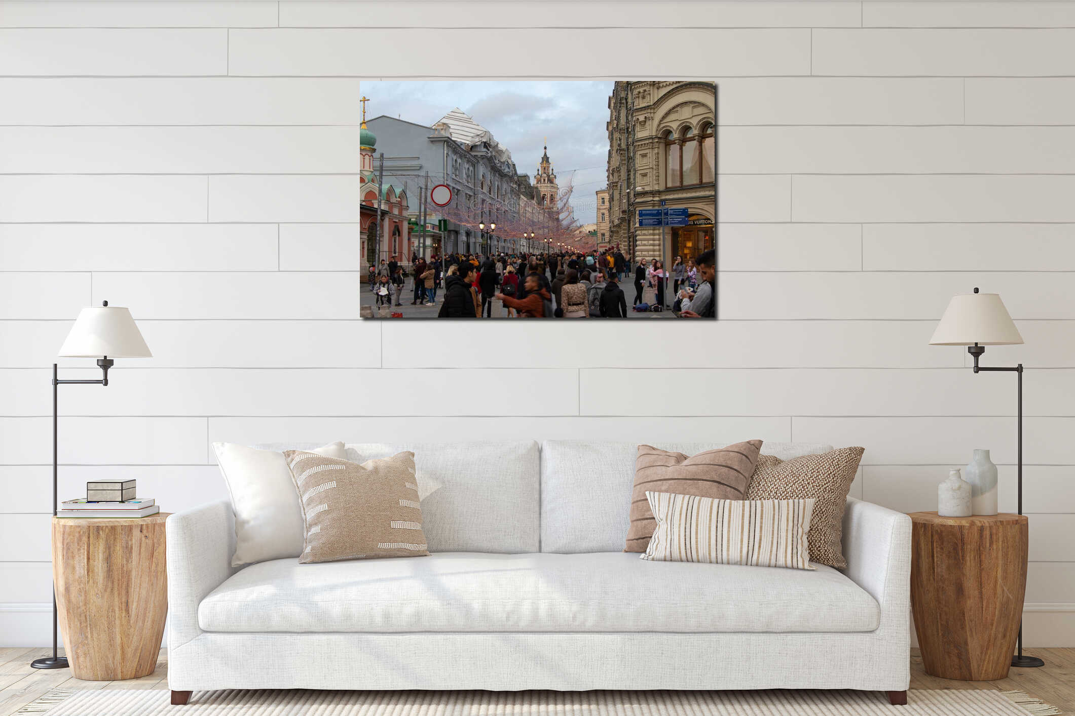 Moscow City Street. A lot of people walking around the city square, Glowing lights of garland hang above the street. interior mockup