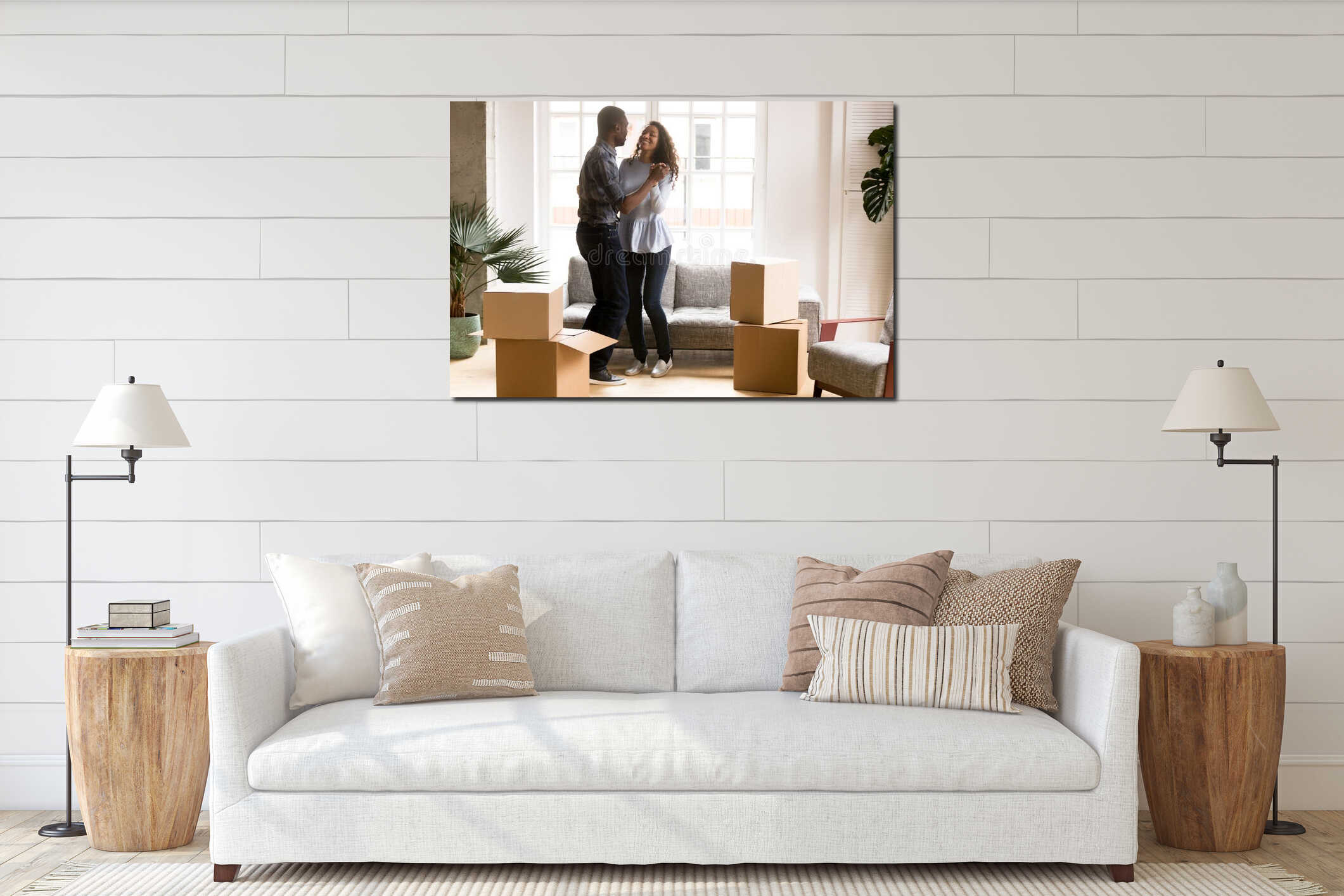Happy African American couple dancing after moving interior mockup