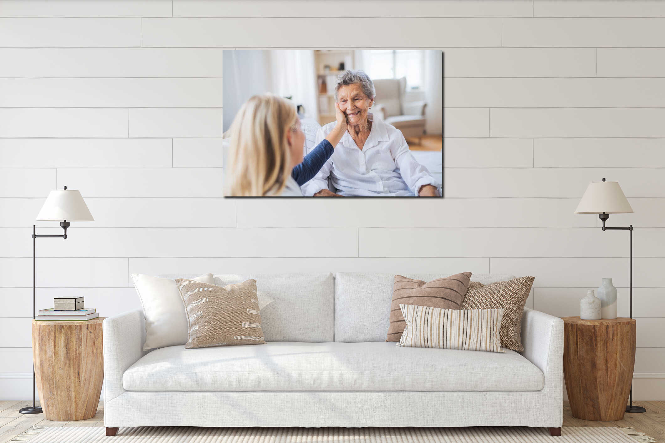 A health visitor talking to a sick senior woman sitting on bed at home. interior mockup