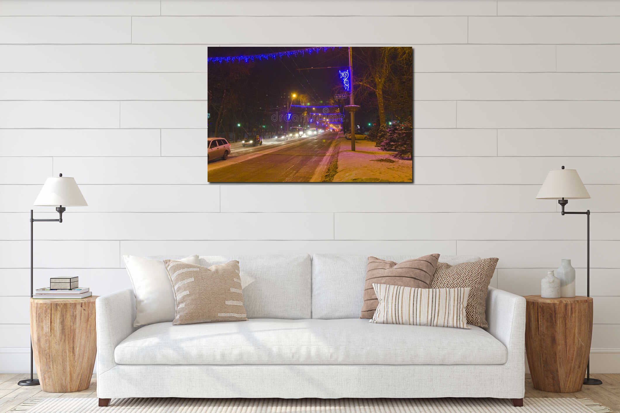 Evening winter city in the light of street lighting lanterns. The street is decorated for the New Year interior mockup