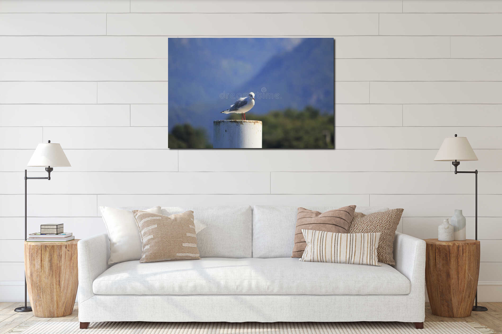 Seagull sitting on a pier on the shore of Lake Como, Italy, interior mockup