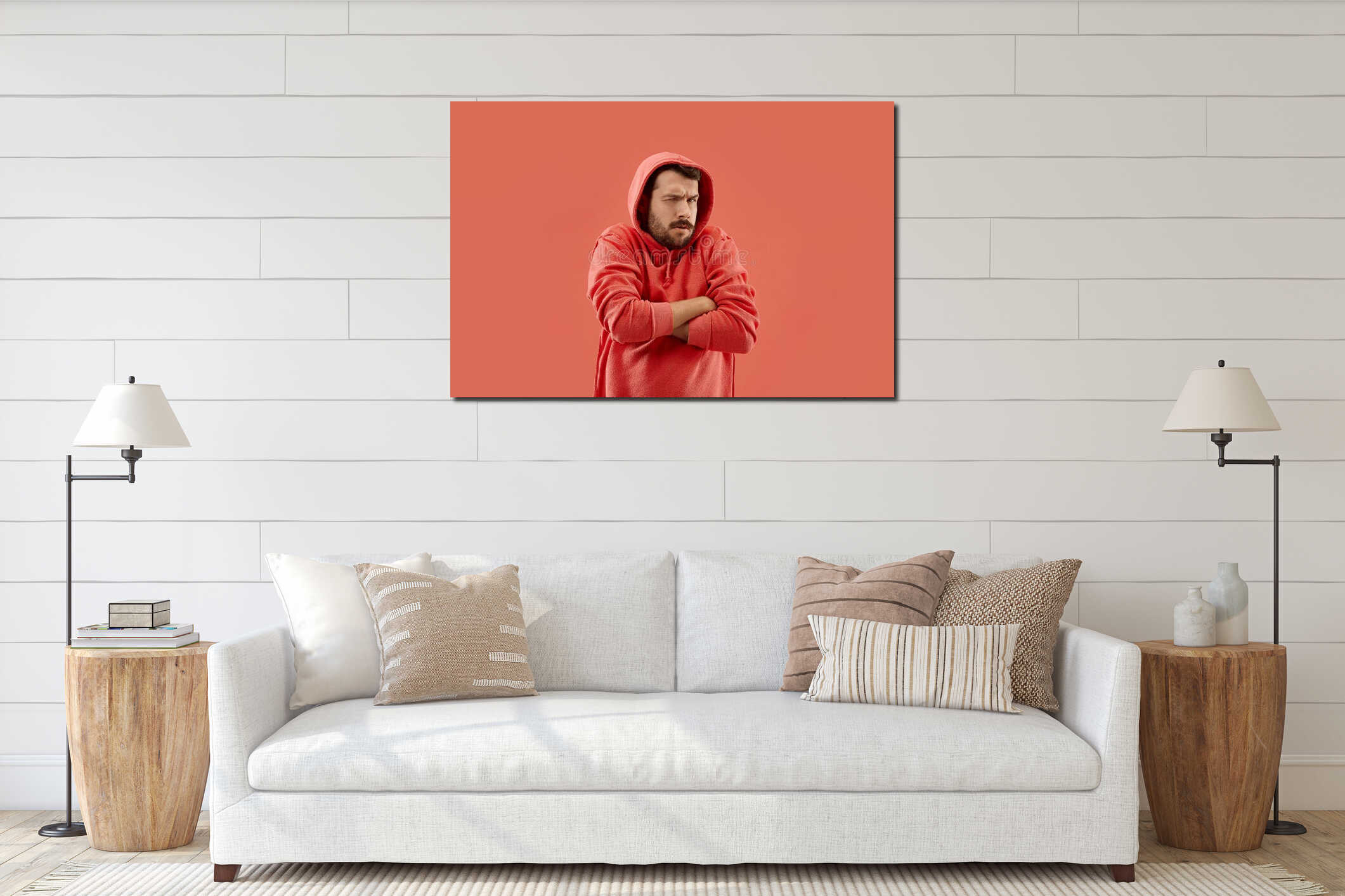 Suspiciont. Doubtful pensive man with thoughtful expression making choice against coral background interior mockup