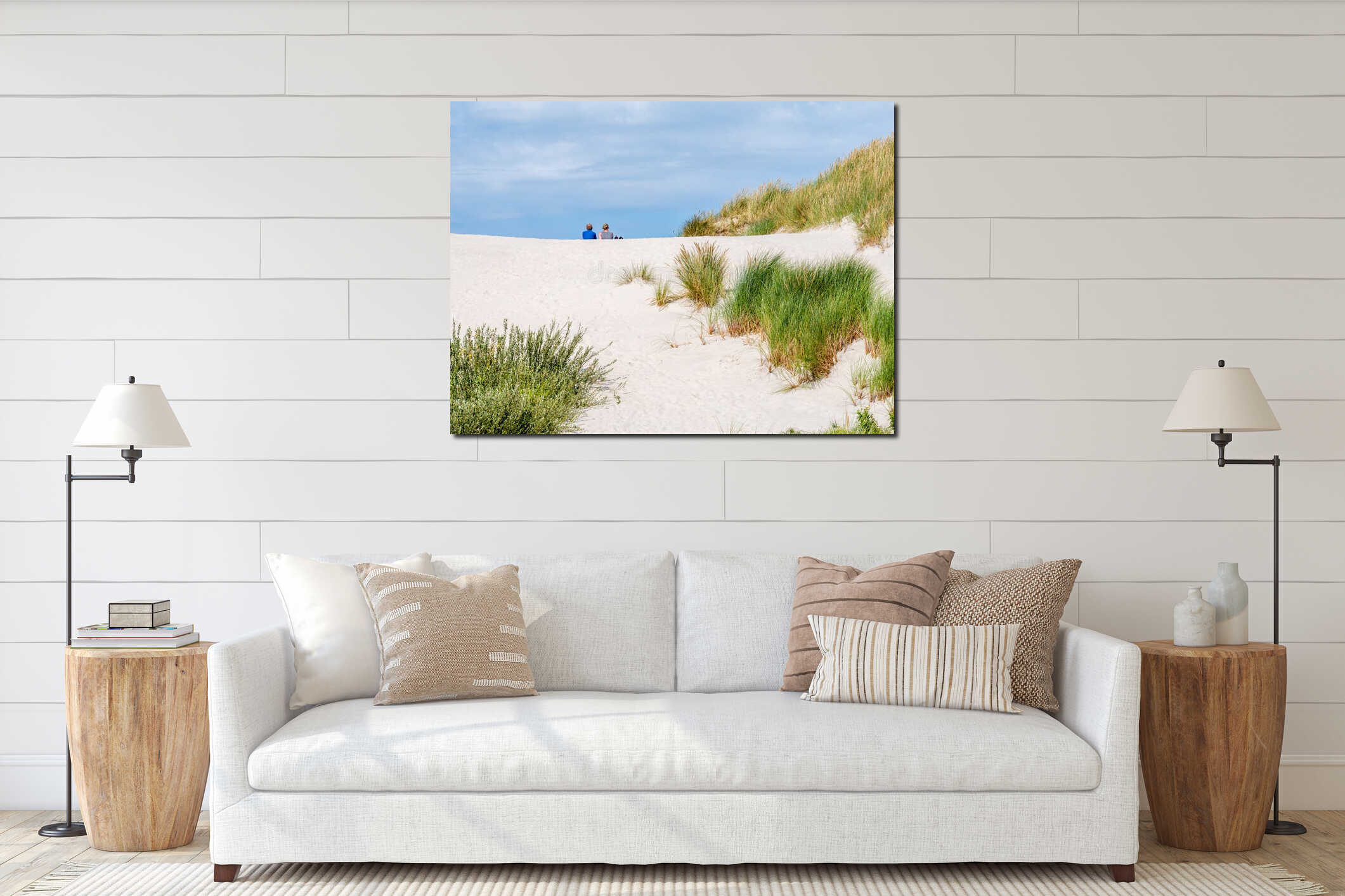 Rear view of two people sitting together on sand dune in nature reserve Het Oerd on West Frisian island Ameland, Friesland, interior mockup