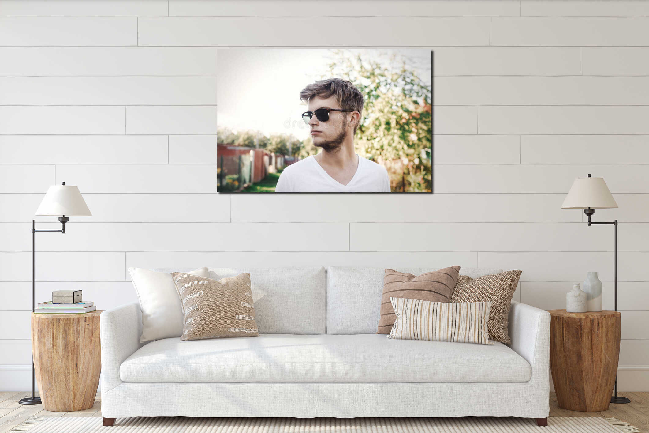 Stylish hipster man in sunglasses posing outdoors in sunny countryside. Handsome bearded man relaxing in evening summer city. interior mockup