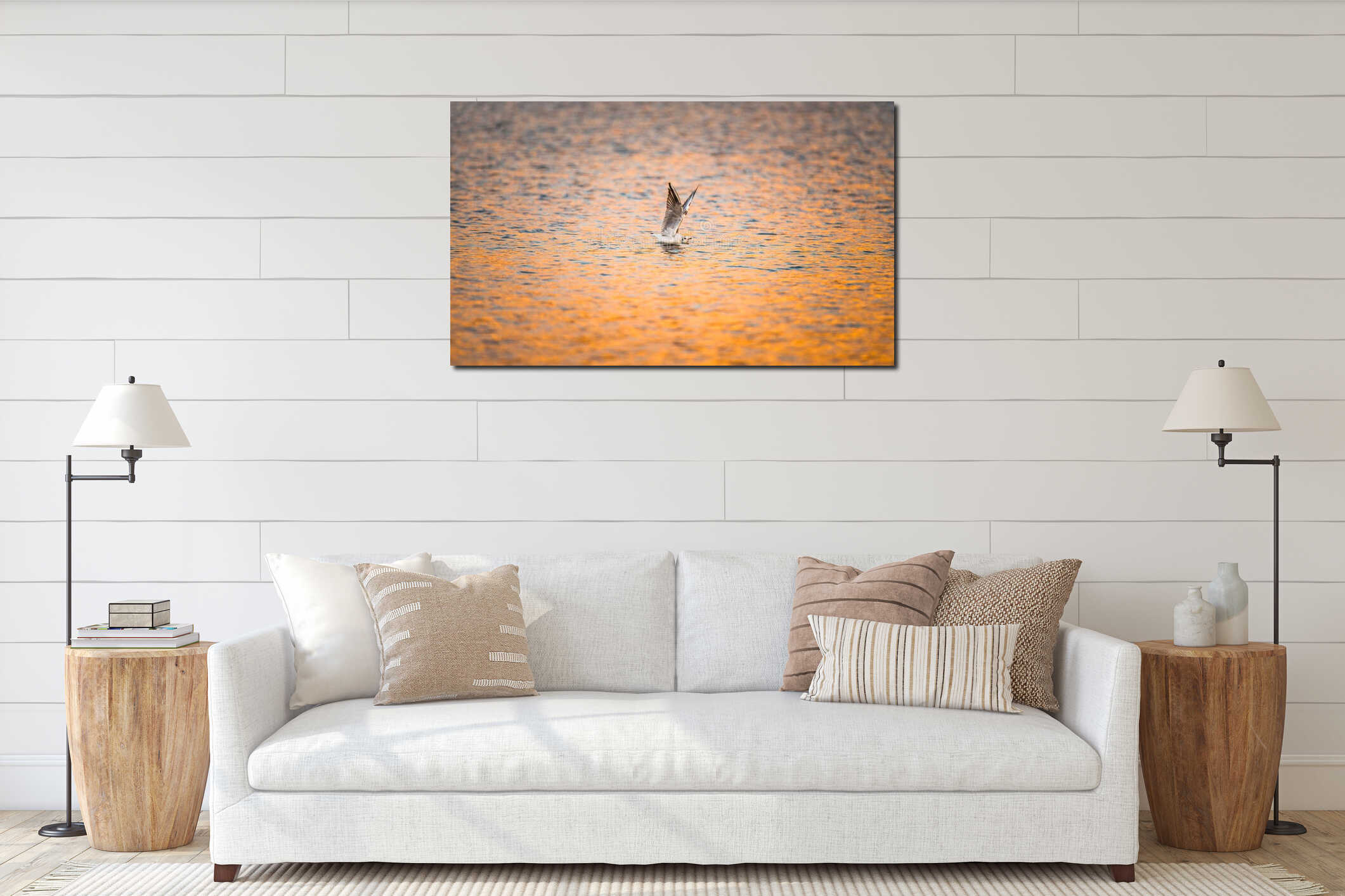 Bird stretches wings while floating on colorful sunset-reflected water interior mockup