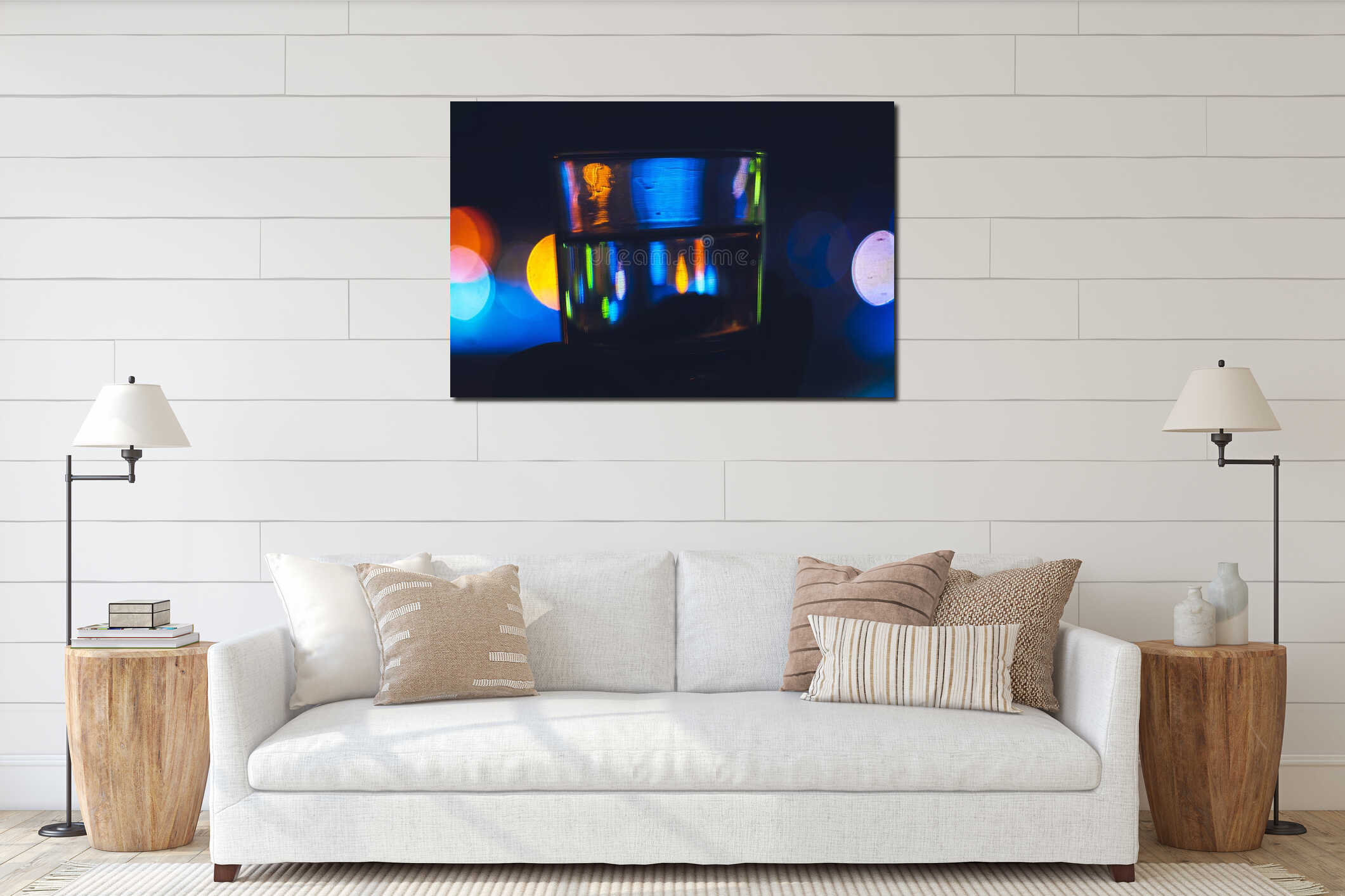 A glass of water and the lights of the evening city interior mockup