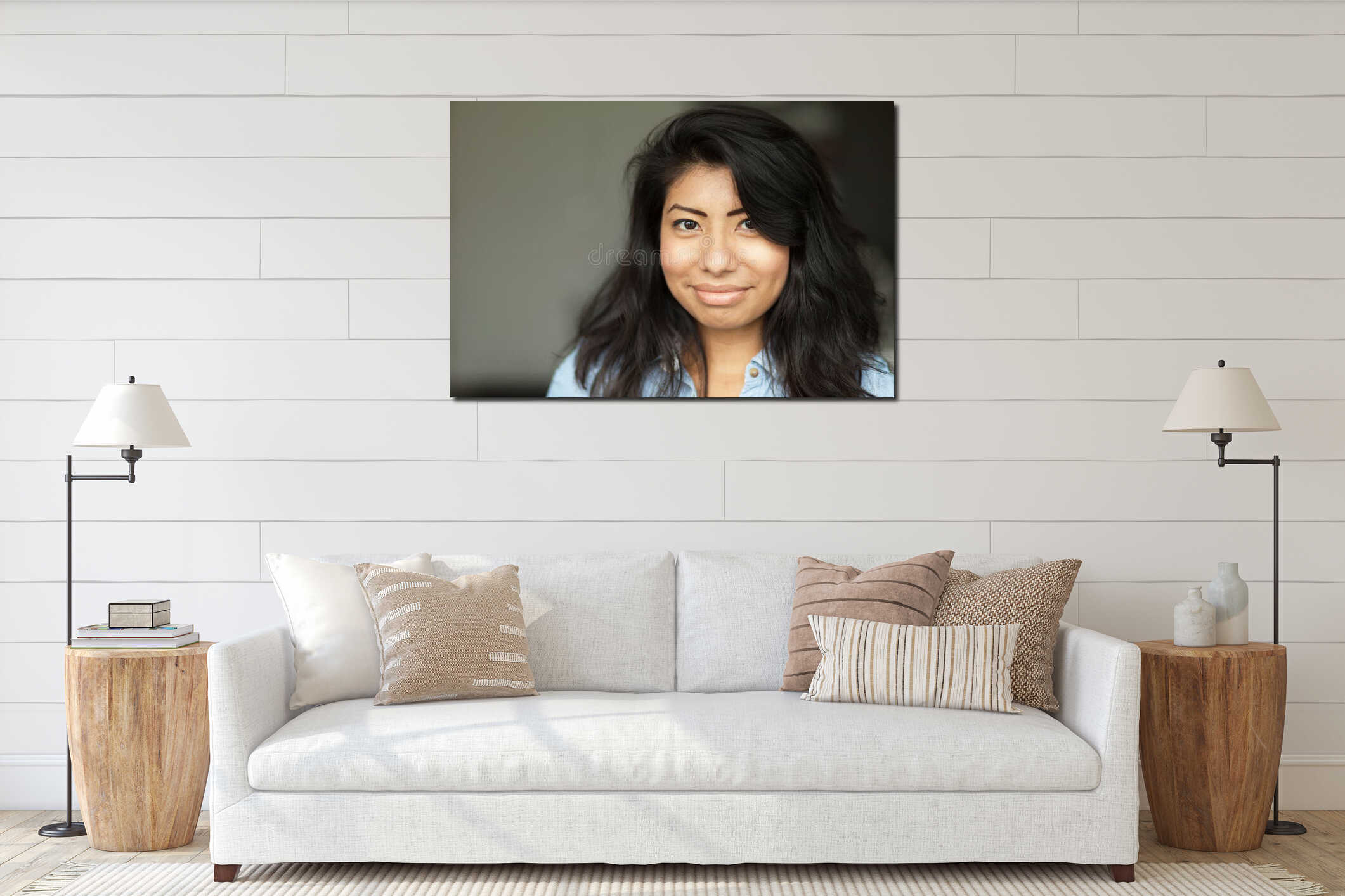 Portrait of a Smiling young Spanish woman. She is happy isolated on gray interior mockup