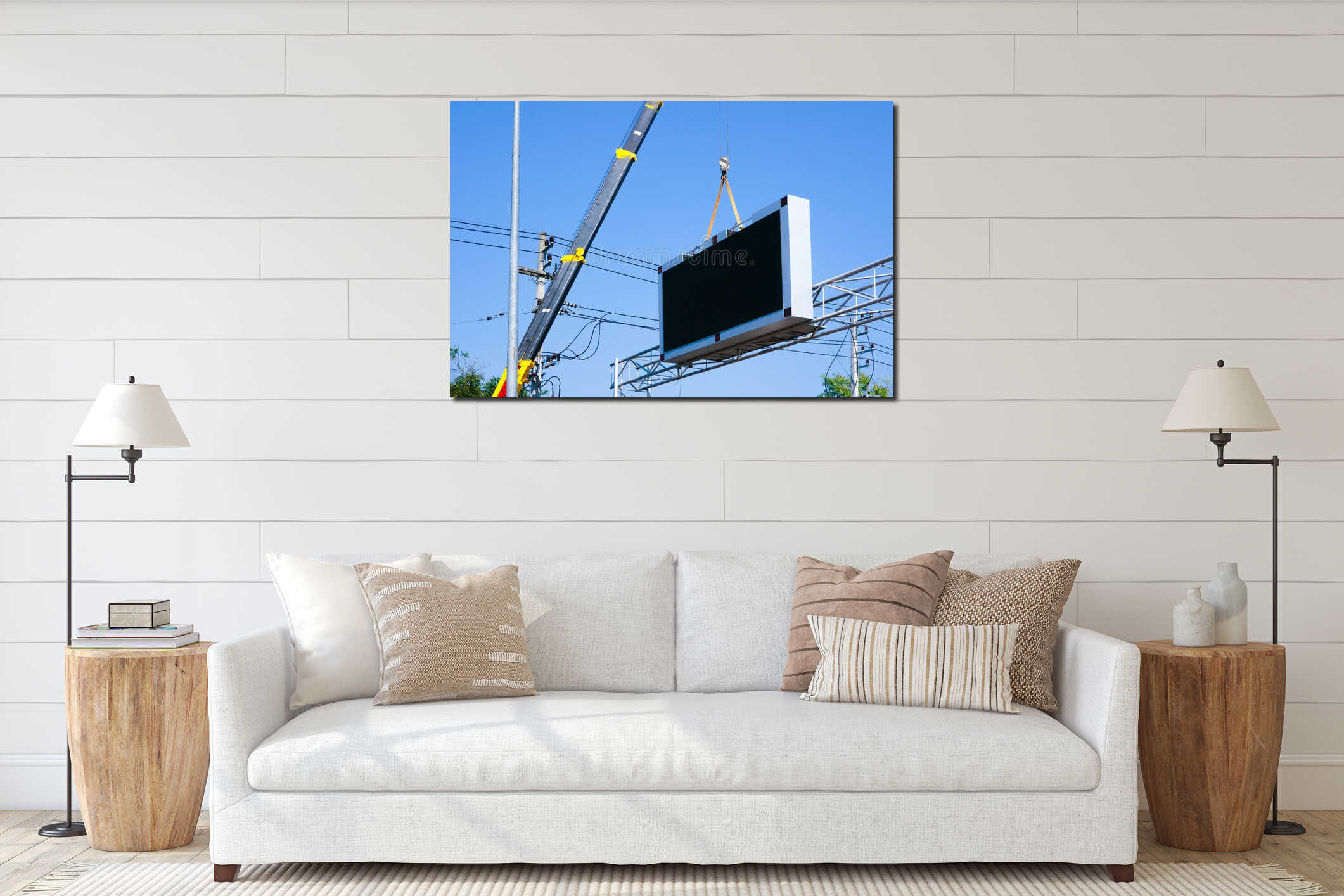 Construction site crane is lifting a led signboard Blank billboard on blue sky background for new advertisement interior mockup