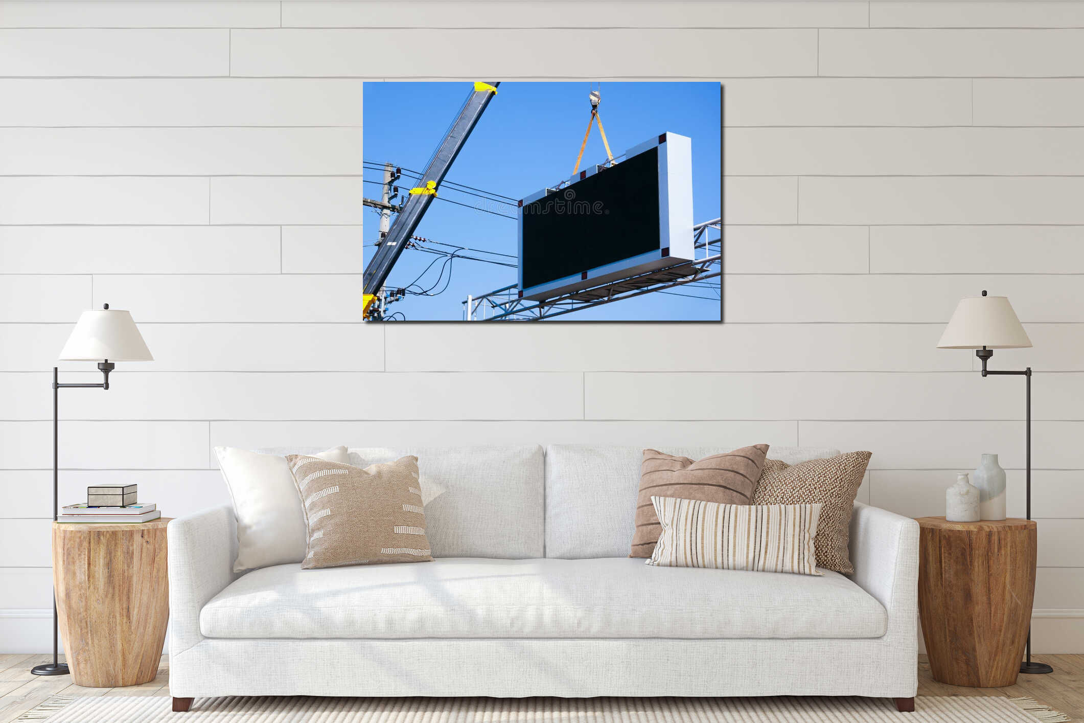 Construction site crane is lifting a led signboard Blank billboard on blue sky background for new advertisement interior mockup