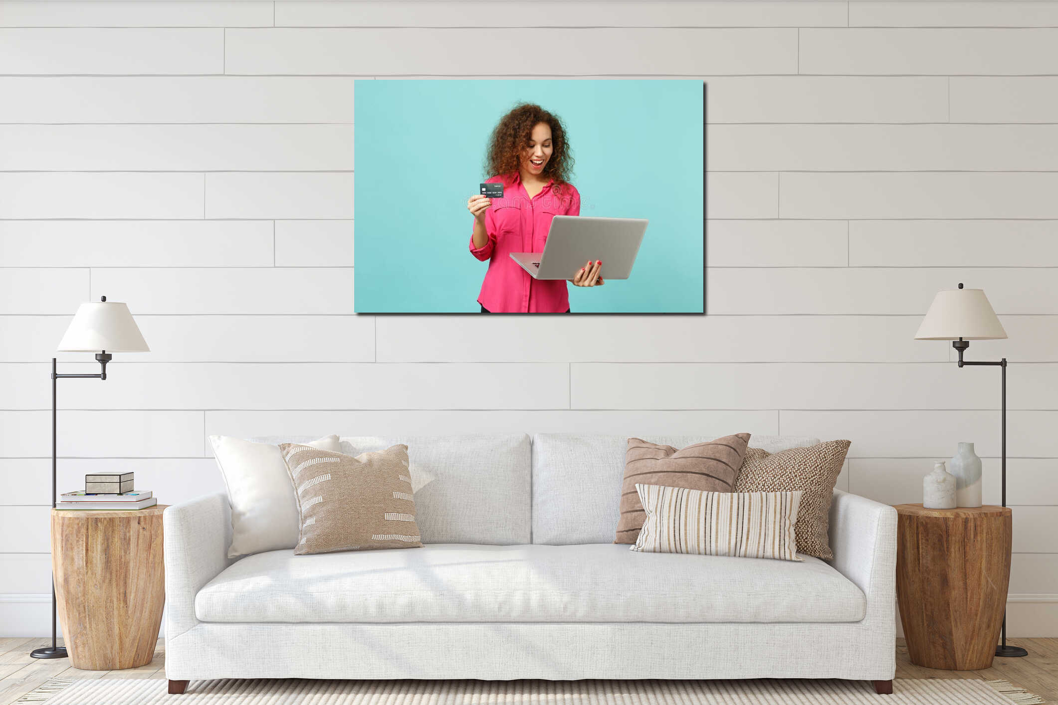 Funny african girl in casual clothes using laptop pc computer, holding credit bank card isolated on blue turquoise interior mockup