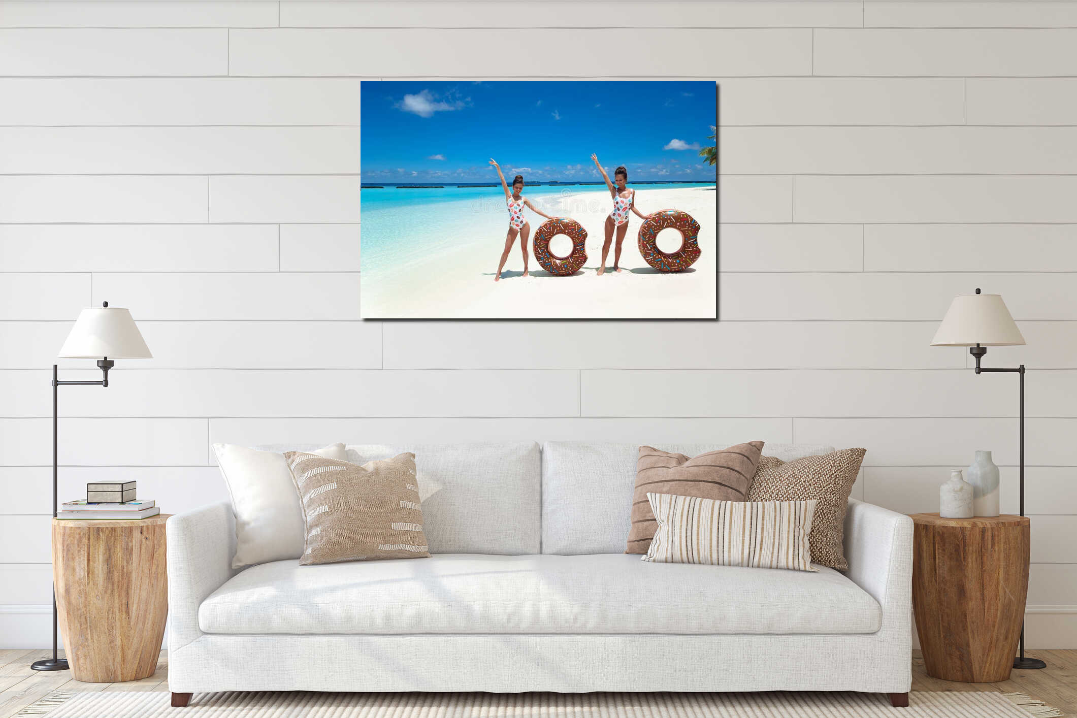 Summer Vacation. Happy free two women with donut float mattress enjoying exotic beach by turquoise water seaside. Maldives island interior mockup