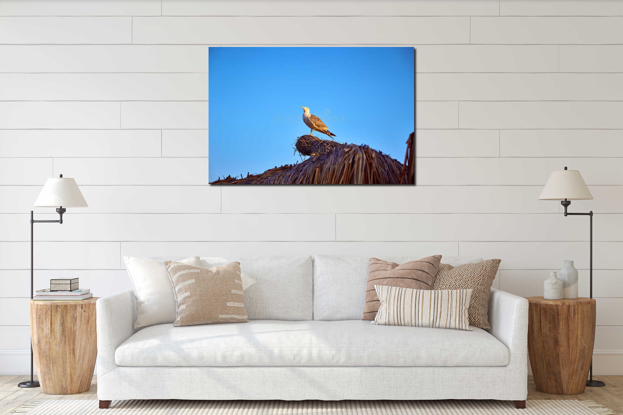 Seagull sits on the roof of a bungalow at sea interior mockup